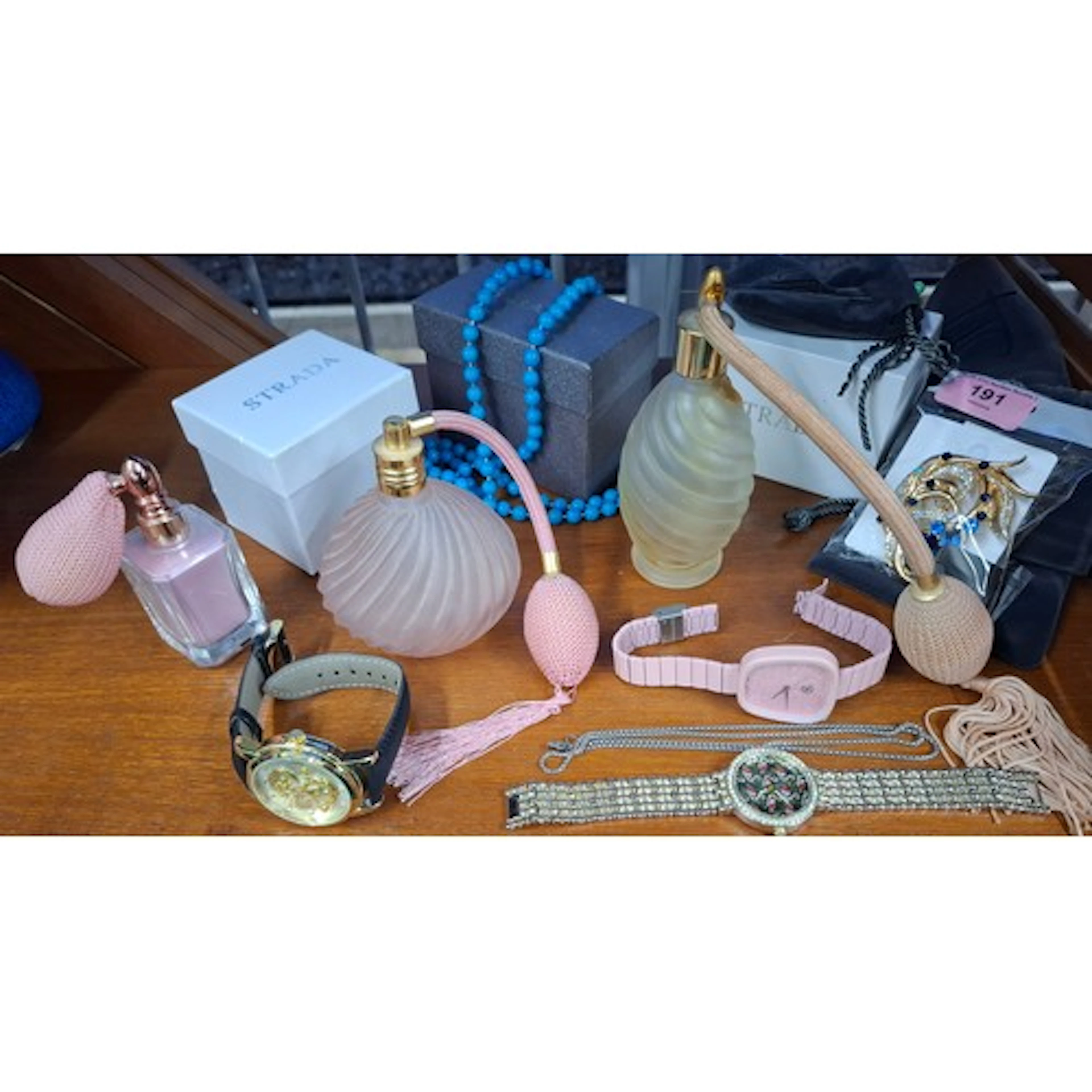 A mixed lot comprising Strada fashion watches, coloured glas...