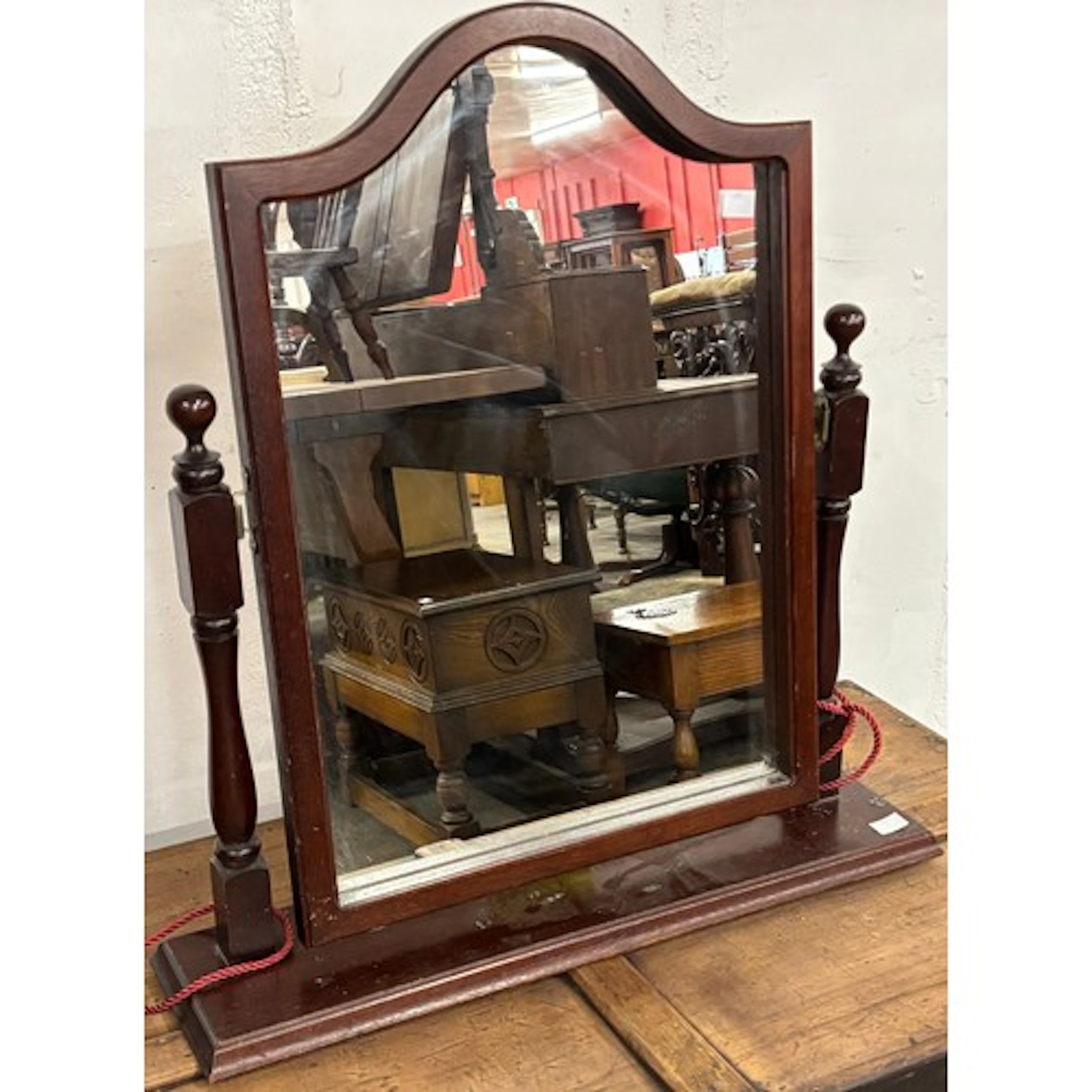 A mahogany dressing table mirror
