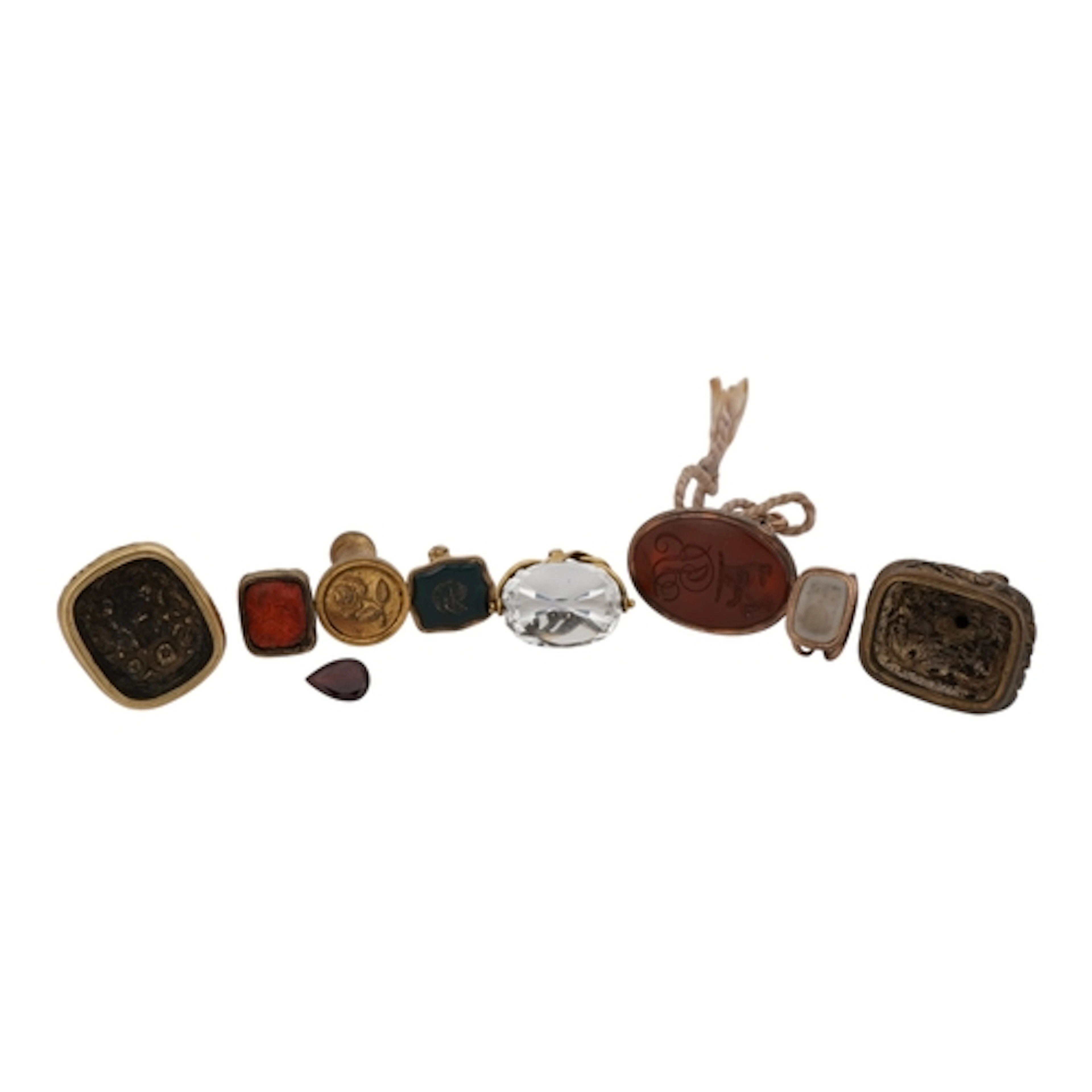 A collection of gilt metal fob seals, comprising: a late Geo...