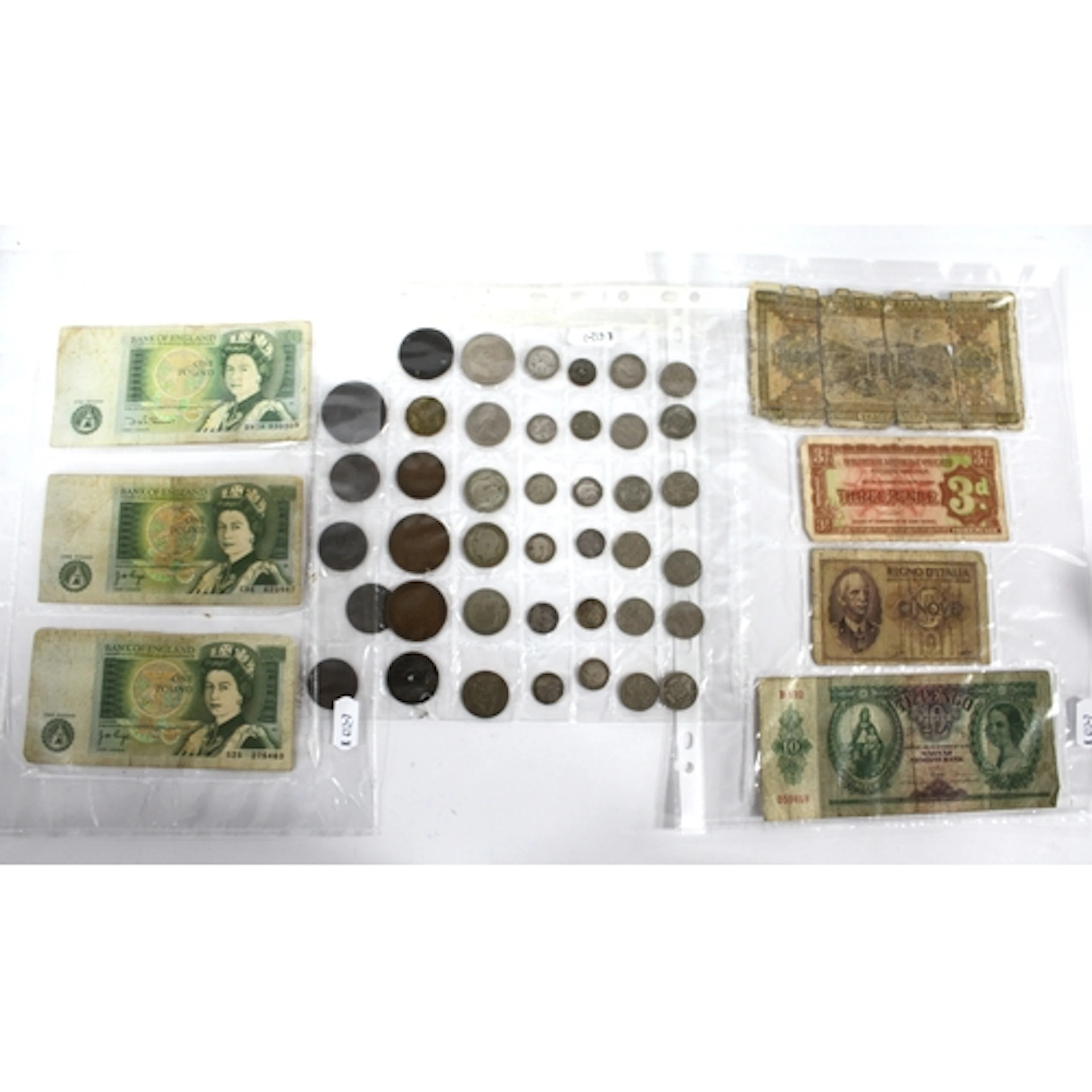 Coins and banknotes, including Bank of England £1 banknotes,...