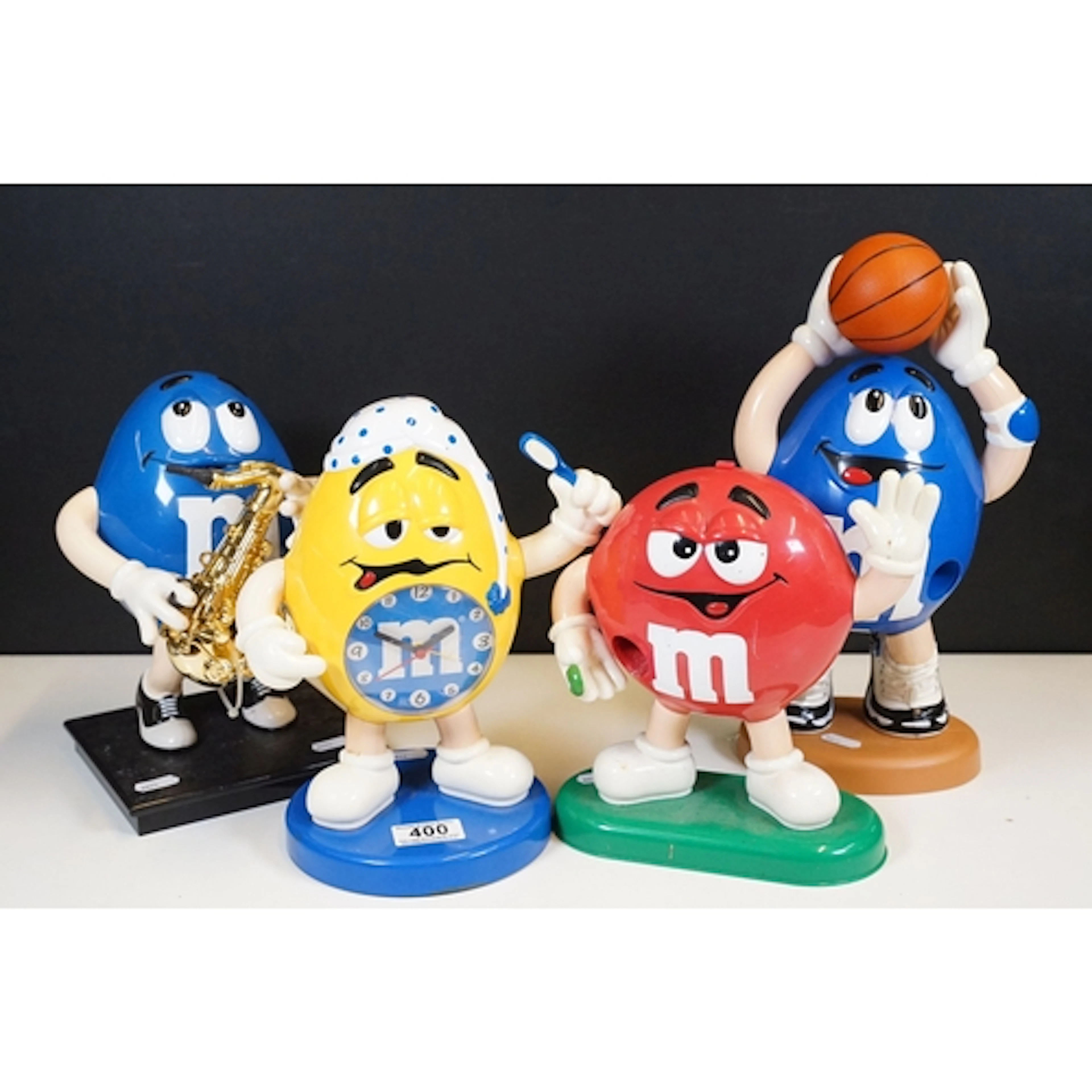 Set of four M&M's promotional memorabilia figures to include...