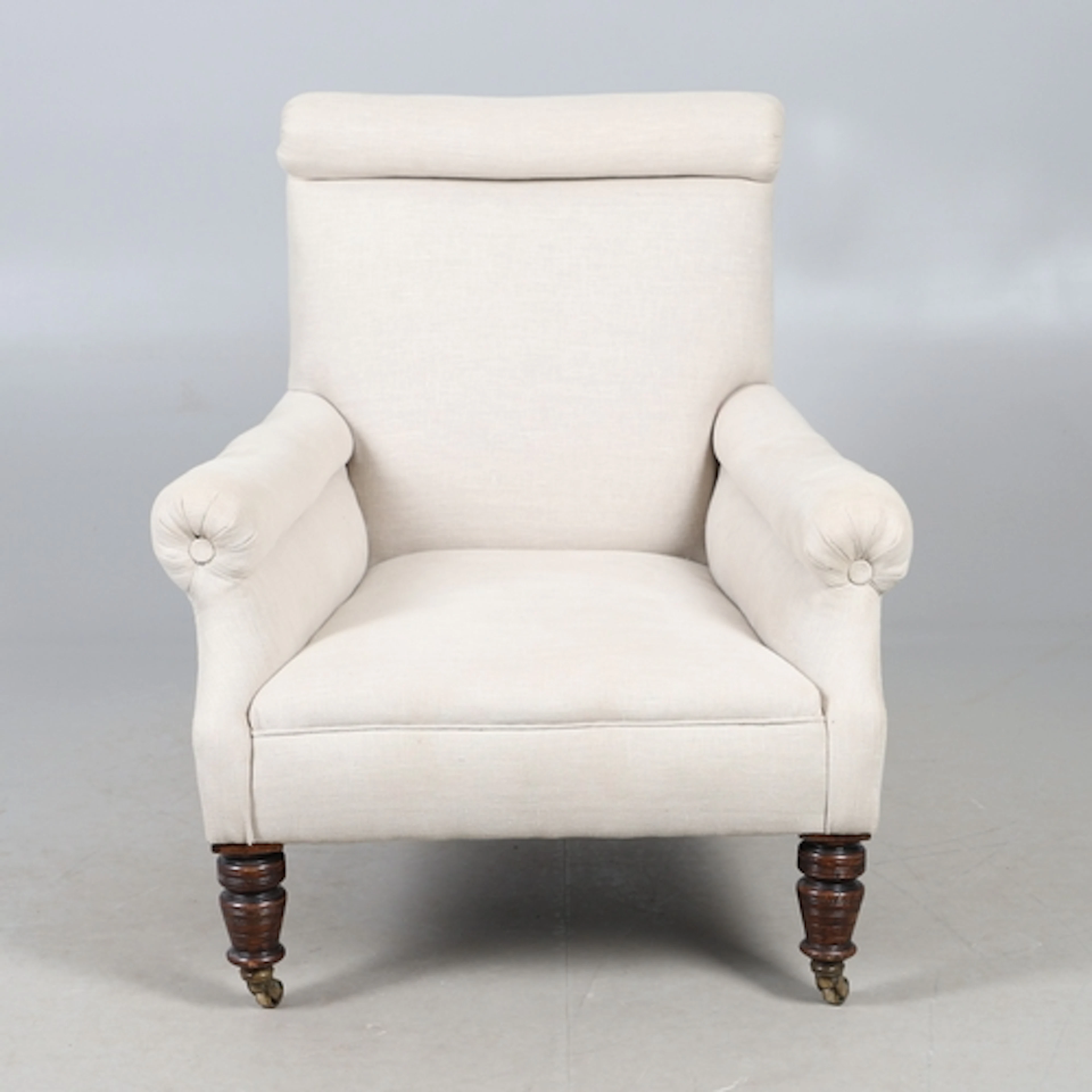 A LATE 19TH CENTURY MAHOGANY DEEP SEATED ARMCHAIR. the rolle...
