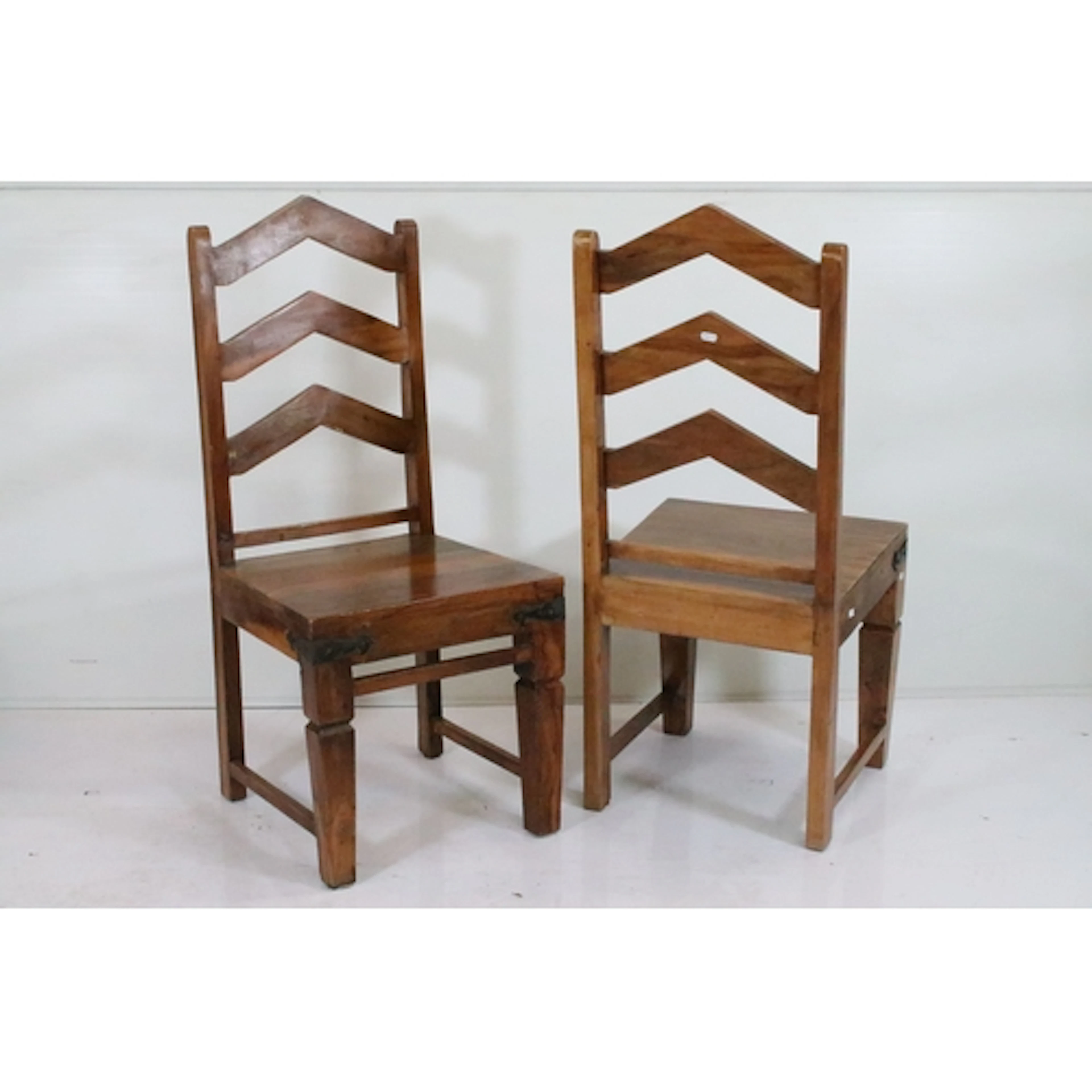 Pair of contemporary Mexican hardwood dining chairs, having ...