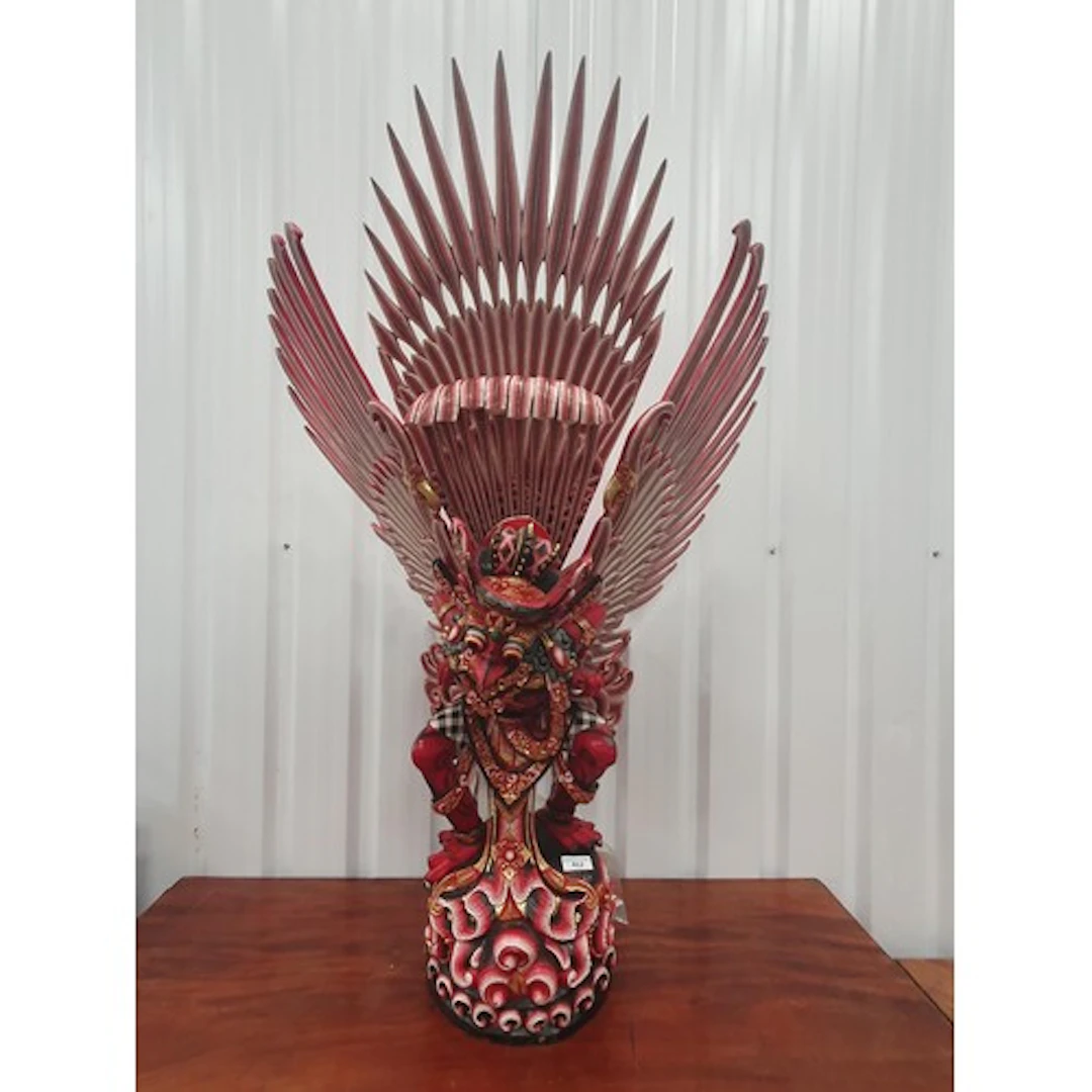 A carved and painted Balinese Garuda Statue.