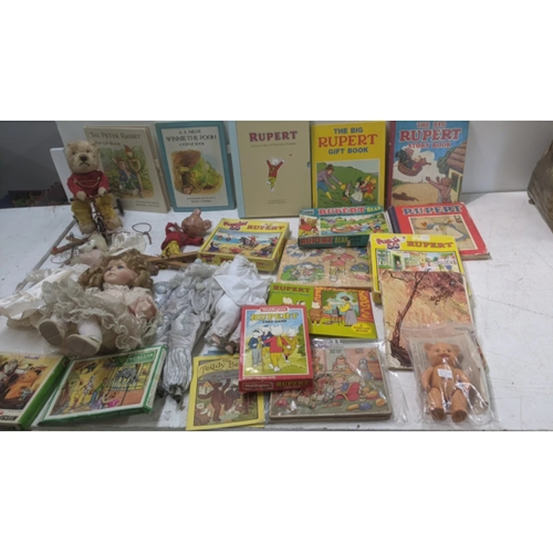 Vintage toys to include a Rupert the bear puppet, a 1950's R...
