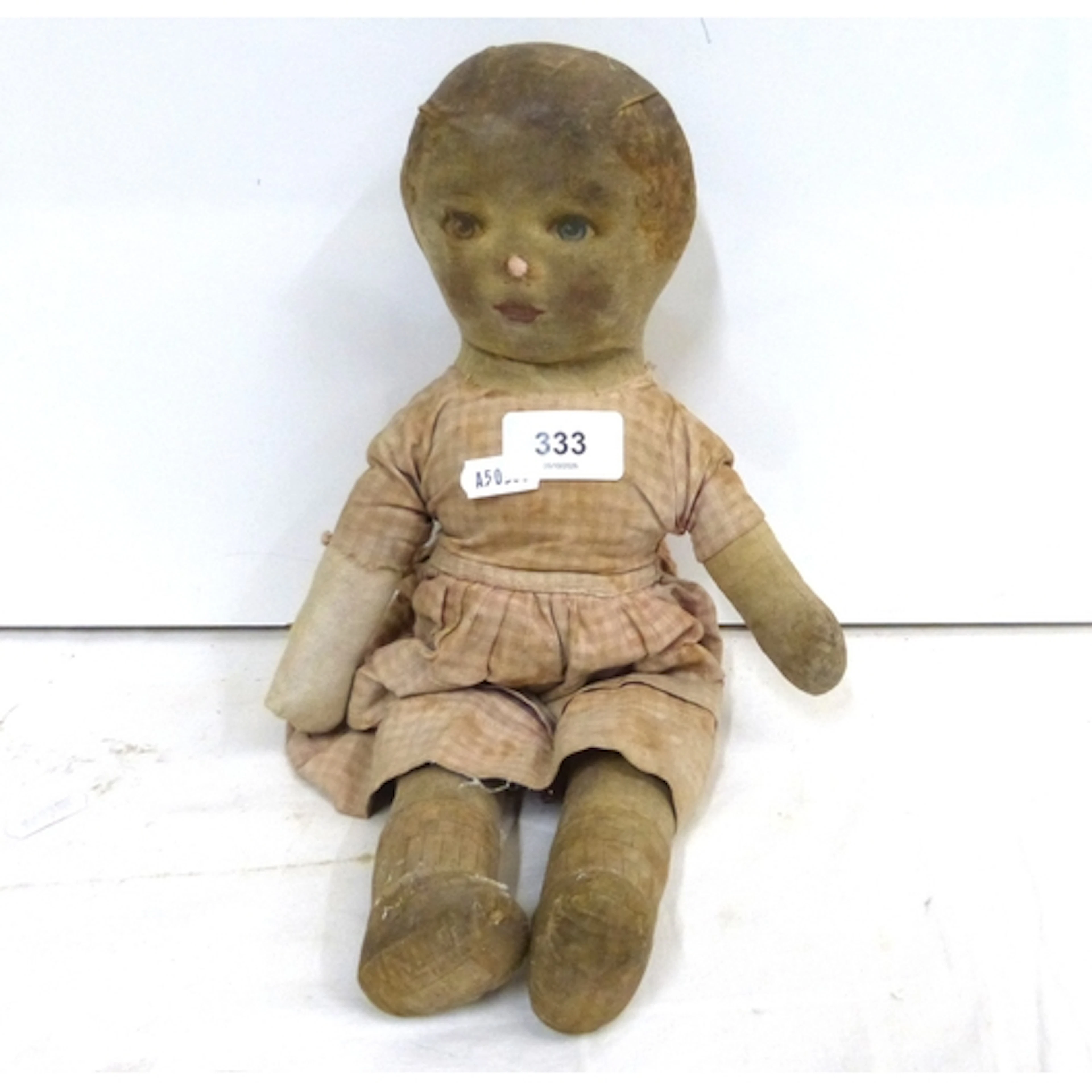 Antique folk art style rag doll.