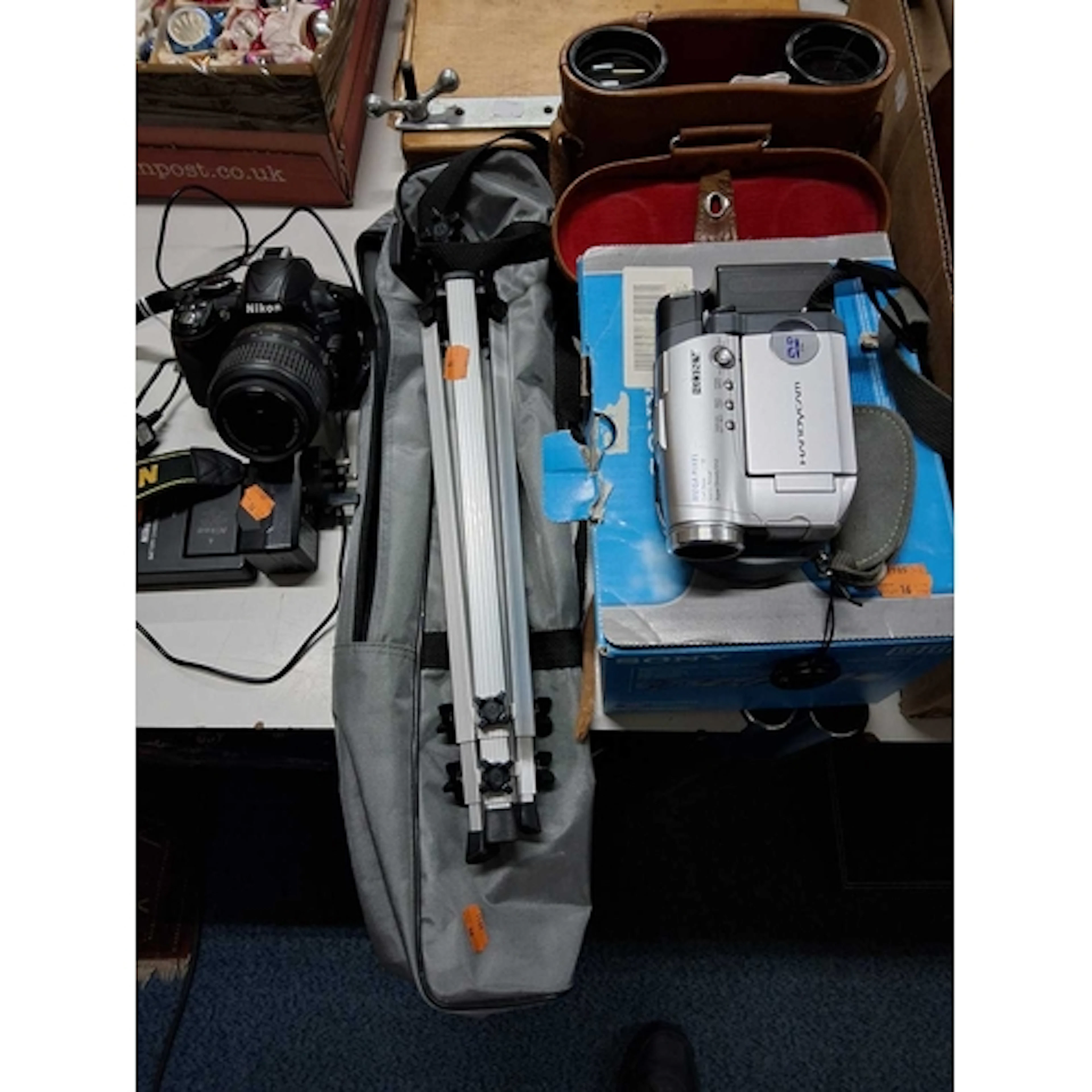 A GROUP OF VISUAL-BASED ITEMS to include a Nikon D3100 camer...
