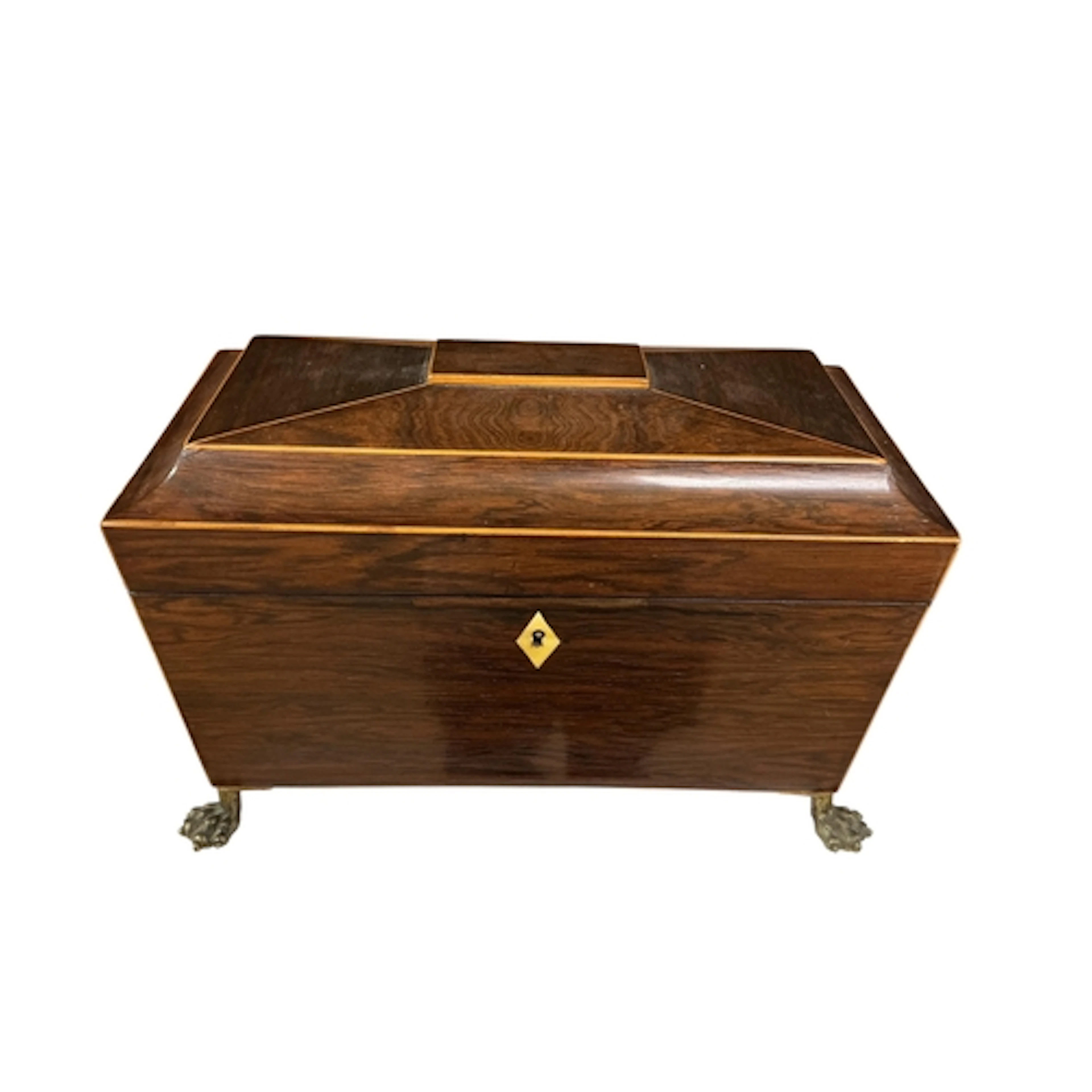 A Regency boxwood strung rosewood sarcophagus tea caddy on b...