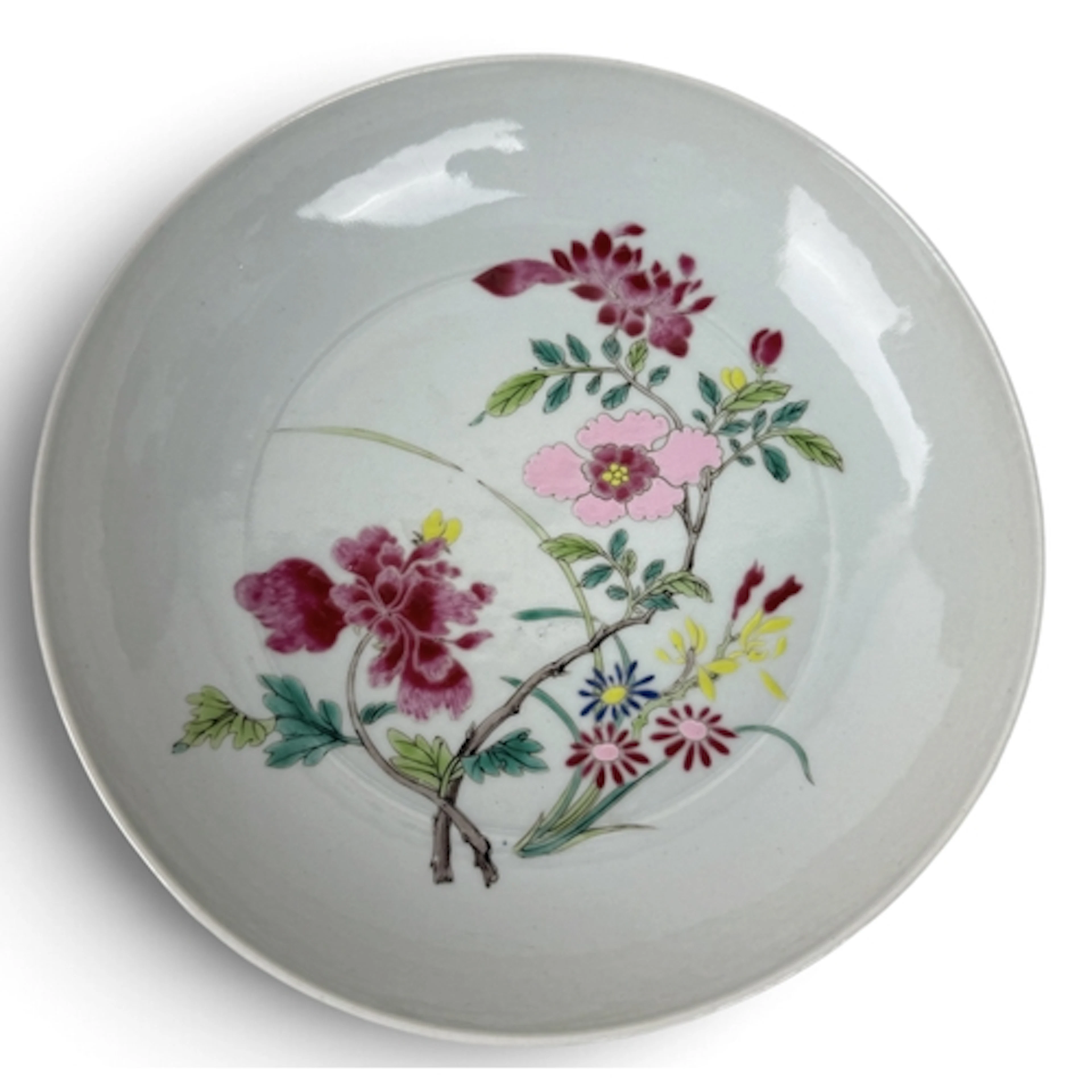 A CHINESE PORCELAIN DISH Painted with flowers to centre. Six...