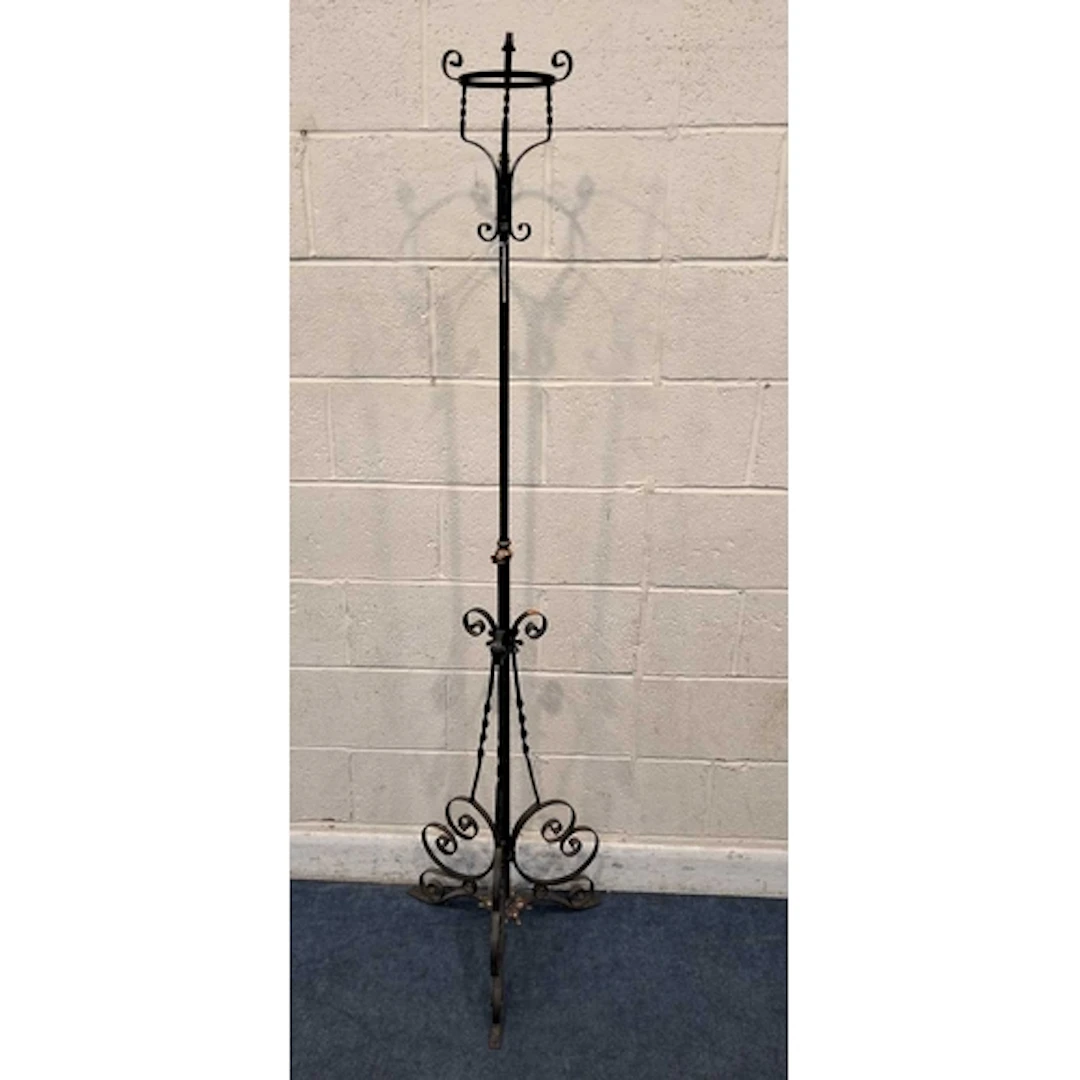 A WROUGHT IRON TELESCOPIC OIL LAMP STAND, with a cradle top,...