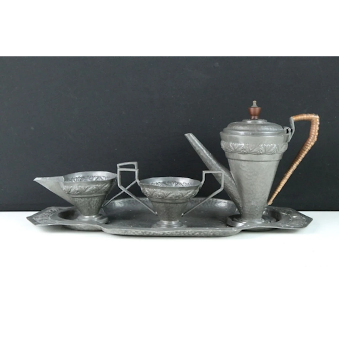 Arts and Crafts Ashberry Pewter part coffee service, with pl...