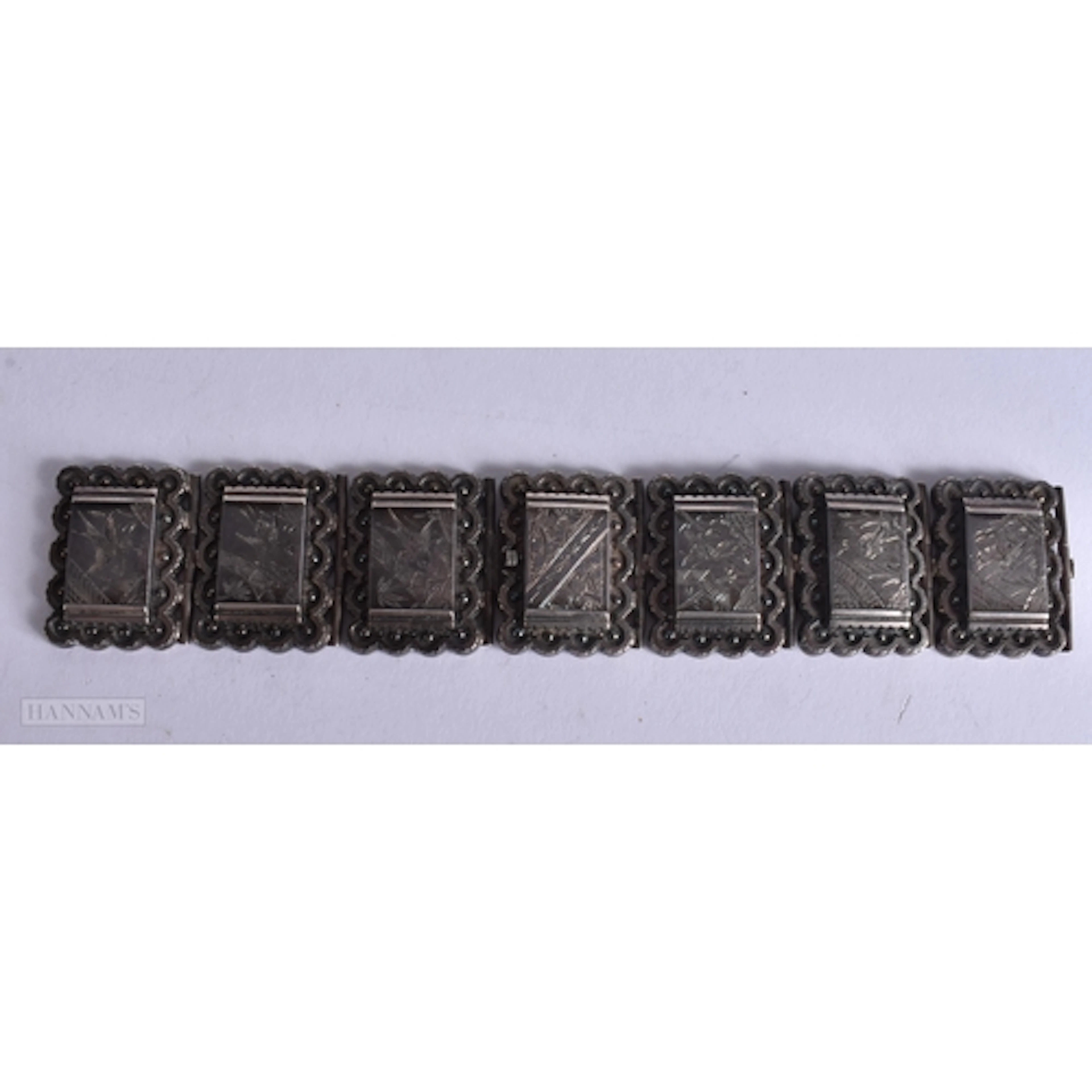 AN AESTHETIC MOVEMENT WHITE METAL BRACELET. 42 grams. 16.5 c...