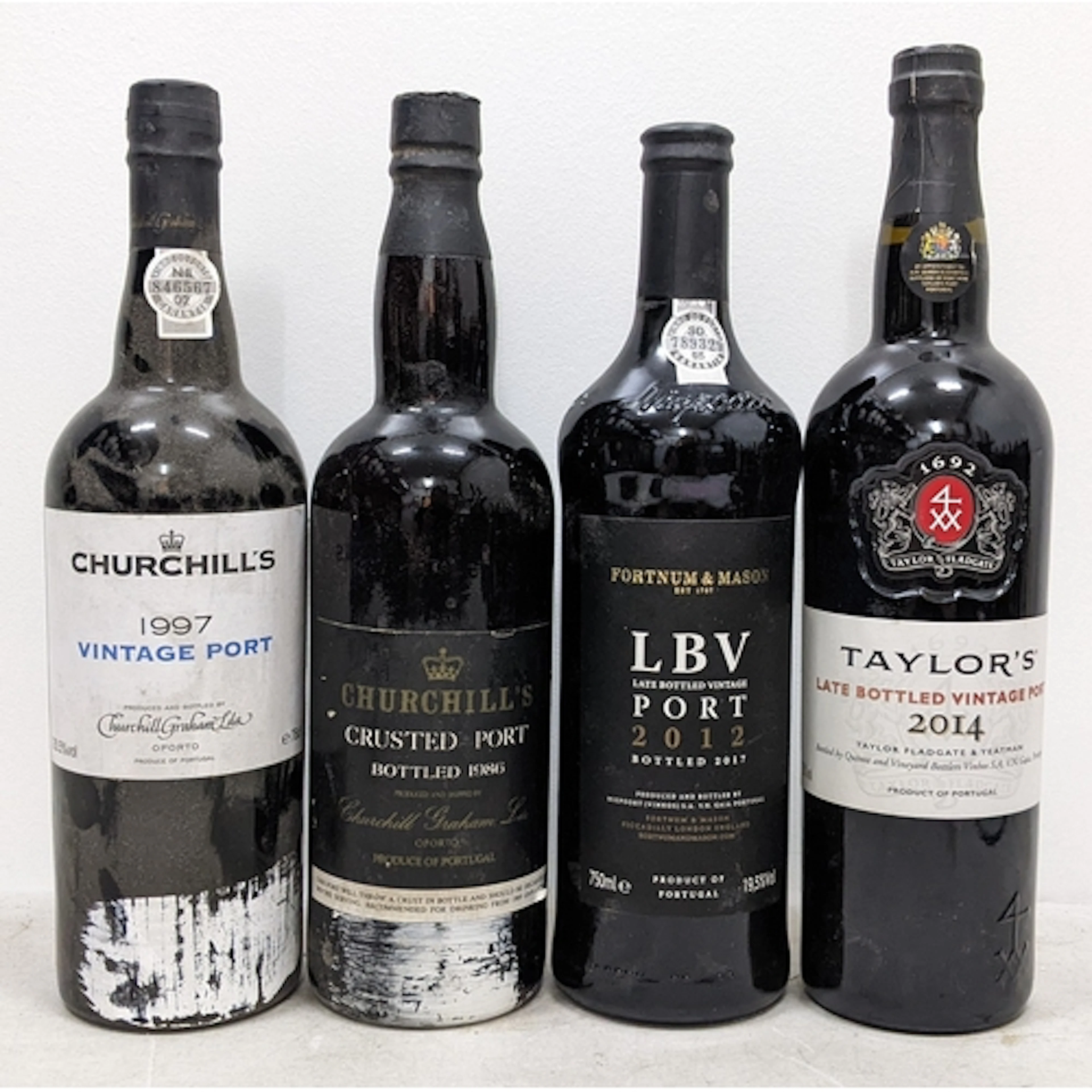 Four bottles of Port, comprising Churchill’s 1997 Vintage Po...