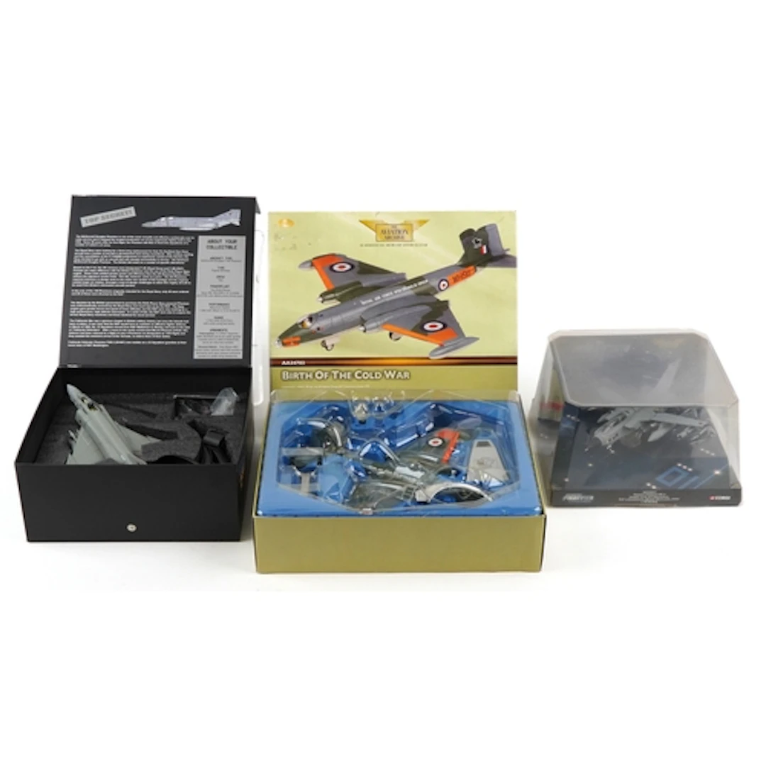 Three diecast collector's aeroplanes including Panavia Torna...