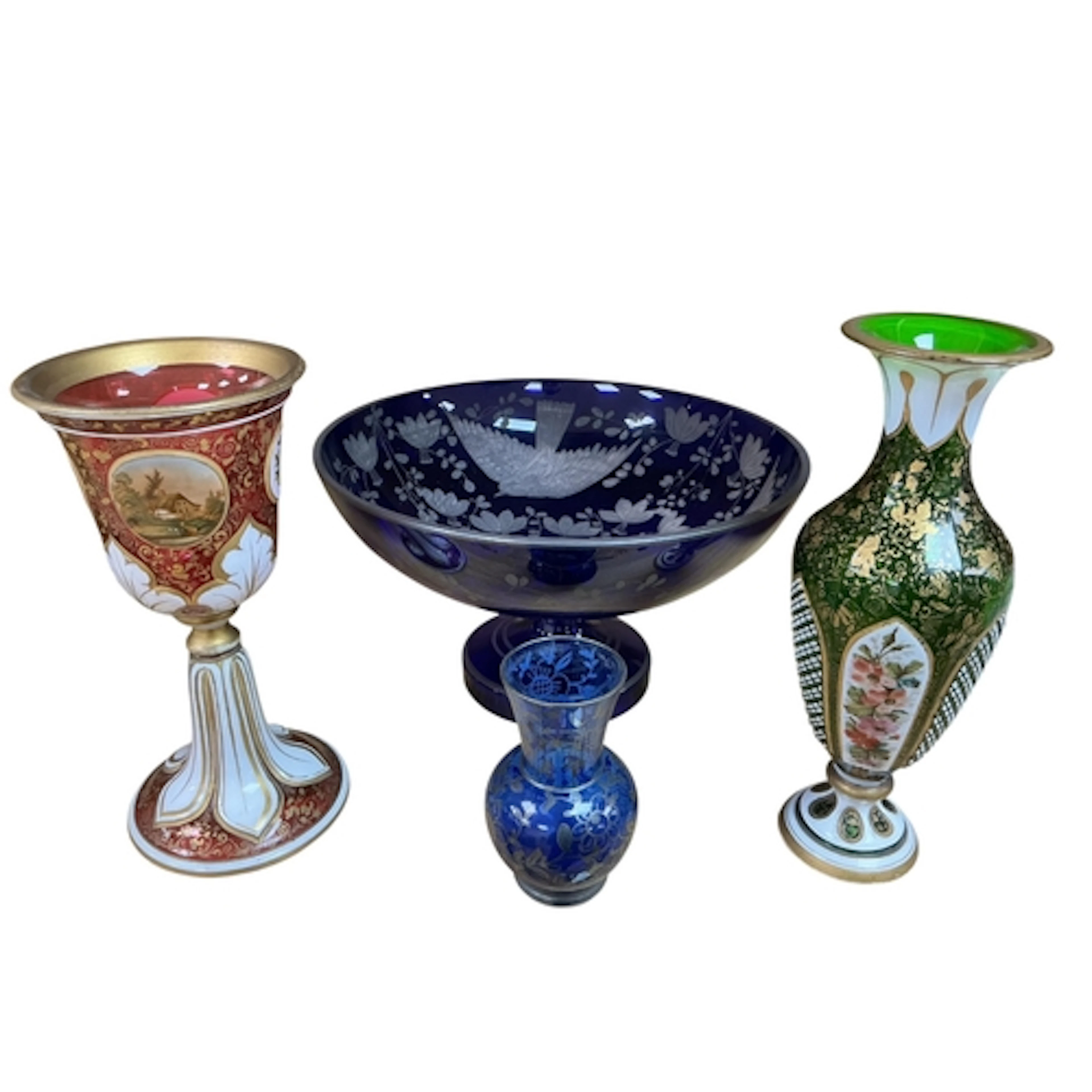 Four pieces of Bohemian glassware to include a cranberry gla...