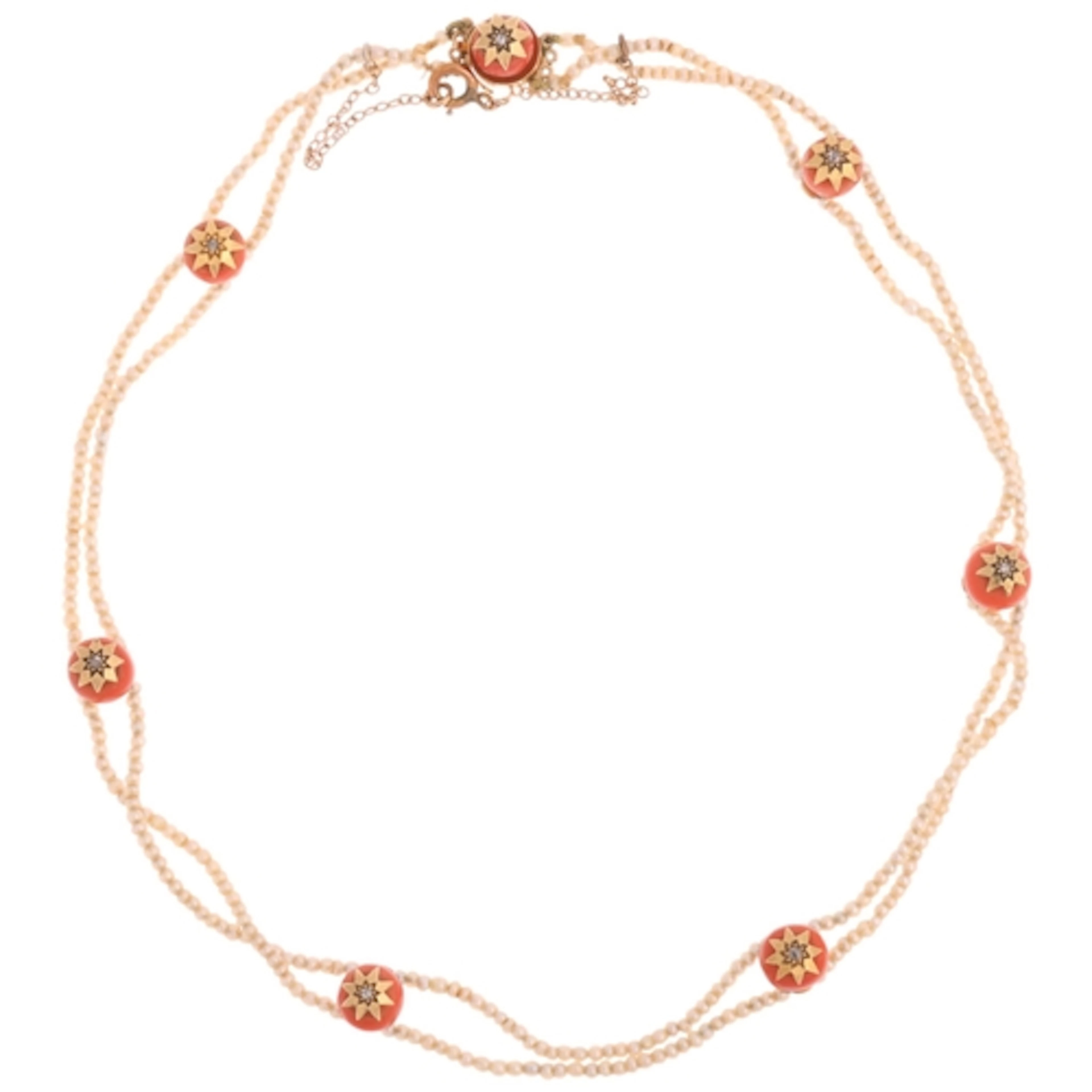 An Antique Victorian seed pearl coral and diamond choker sta...