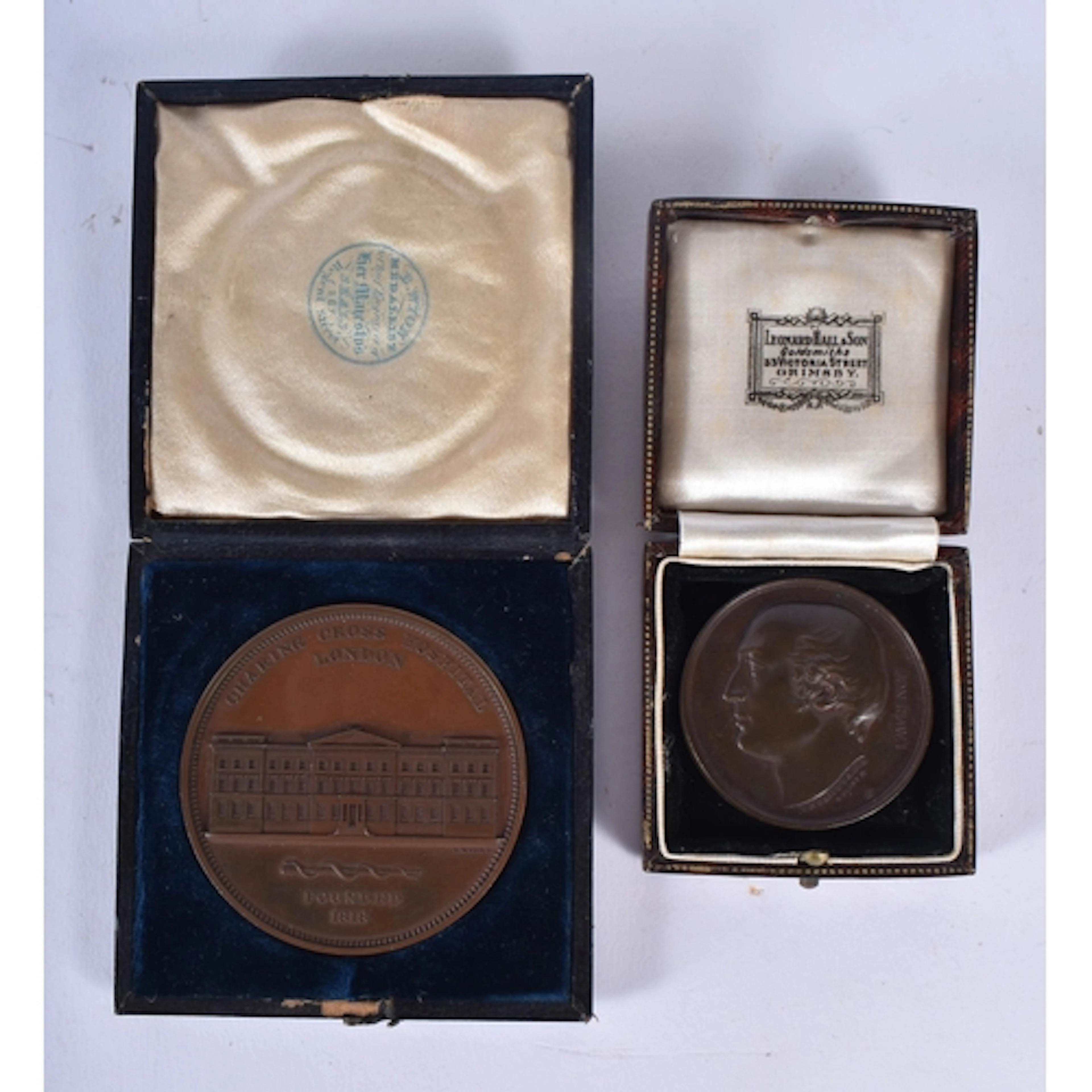 An antique medical related brass medallion with filled case ...