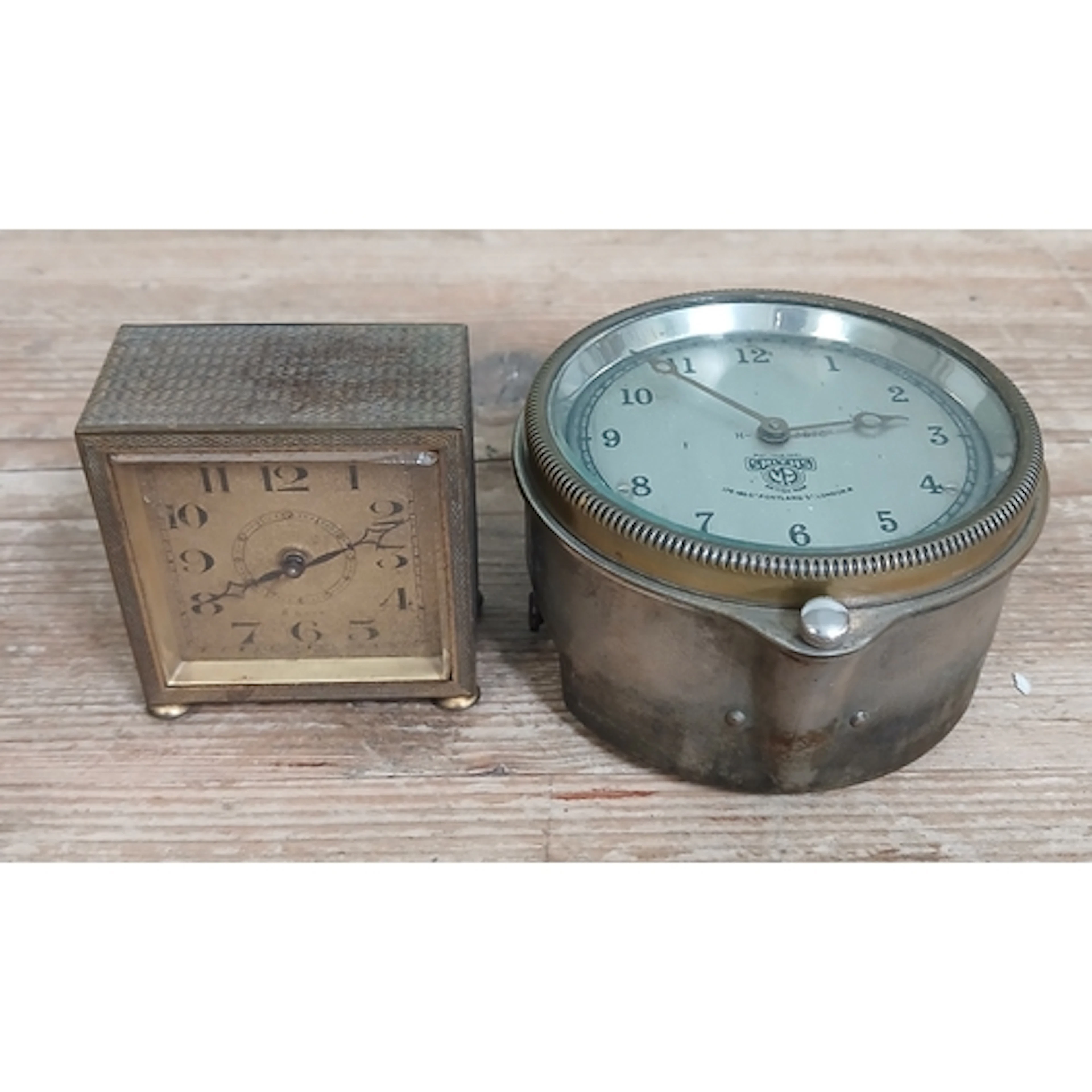 A Smiths car clock and a desk clock.