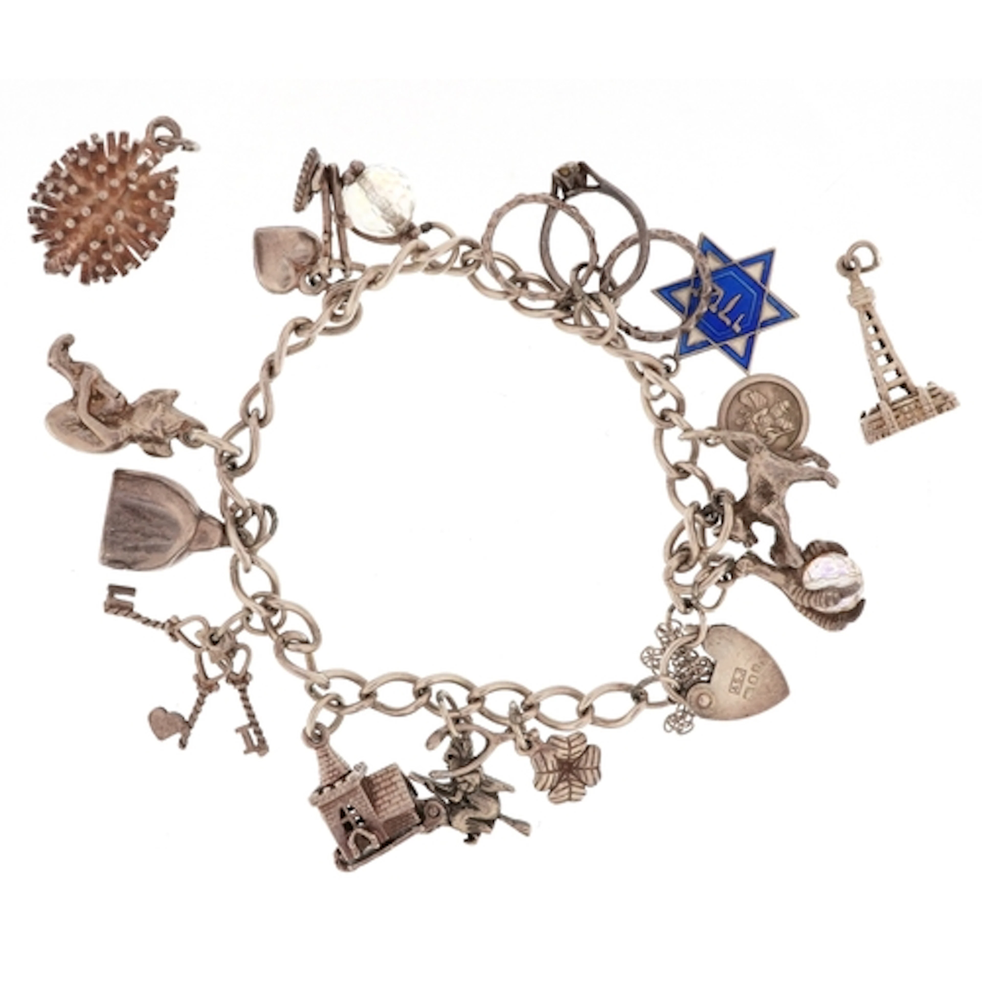 Silver charm bracelet with a selection of mostly silver char...