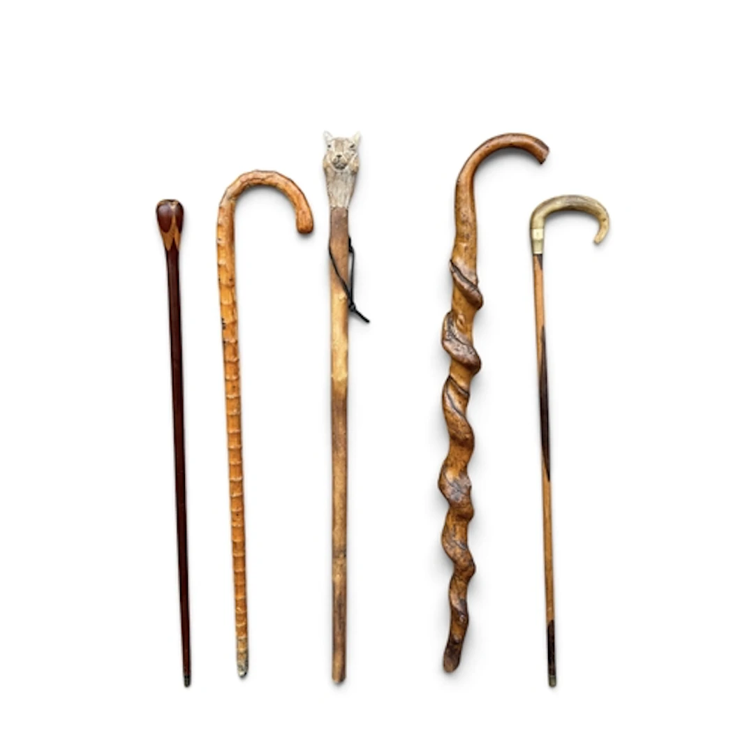 FIVE VINTAGE WOODEN WALKING STICKS One with carved squirrel ...