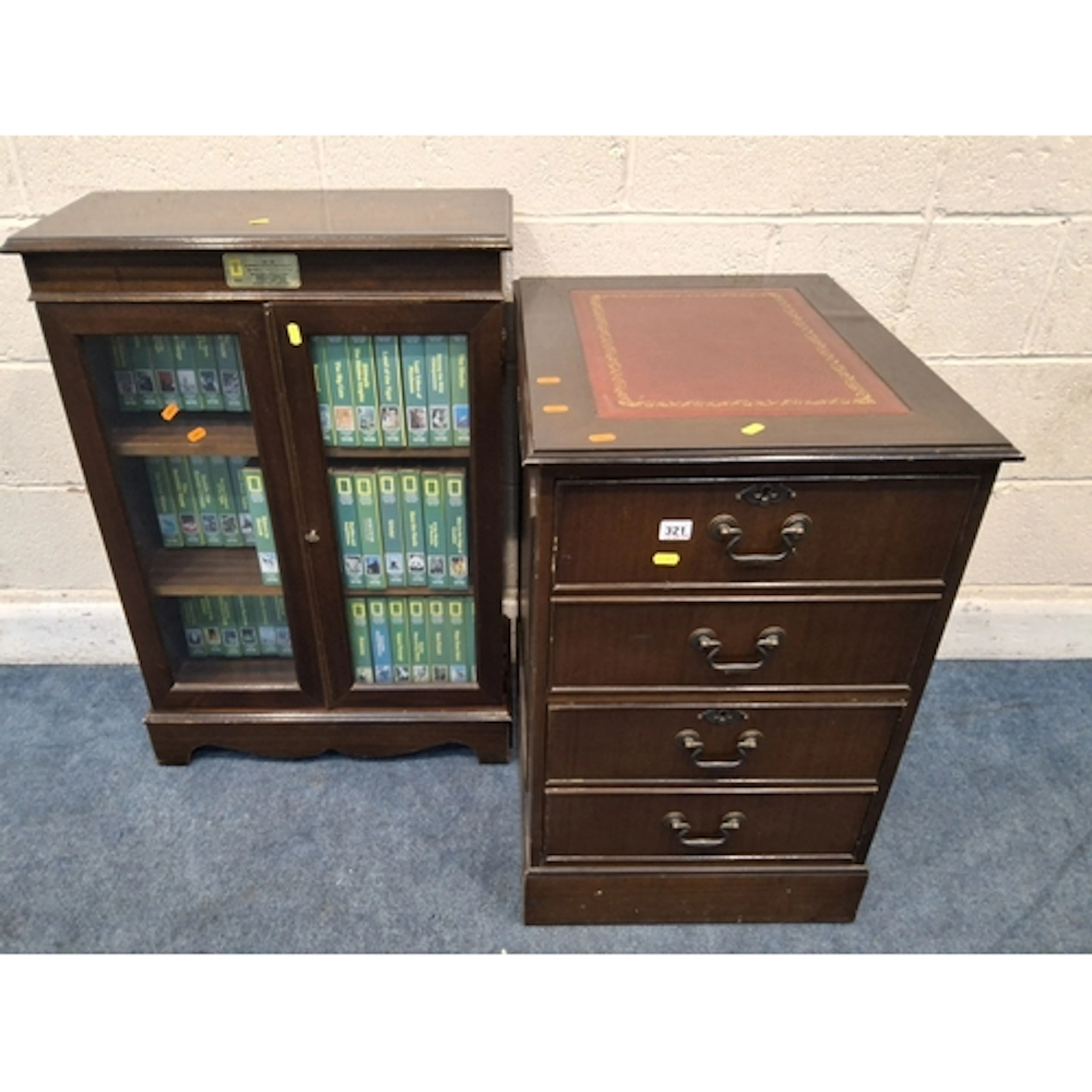 A REPRODUCTION MAHOGANY TWO DRAWER FILING CABINET, with a re...