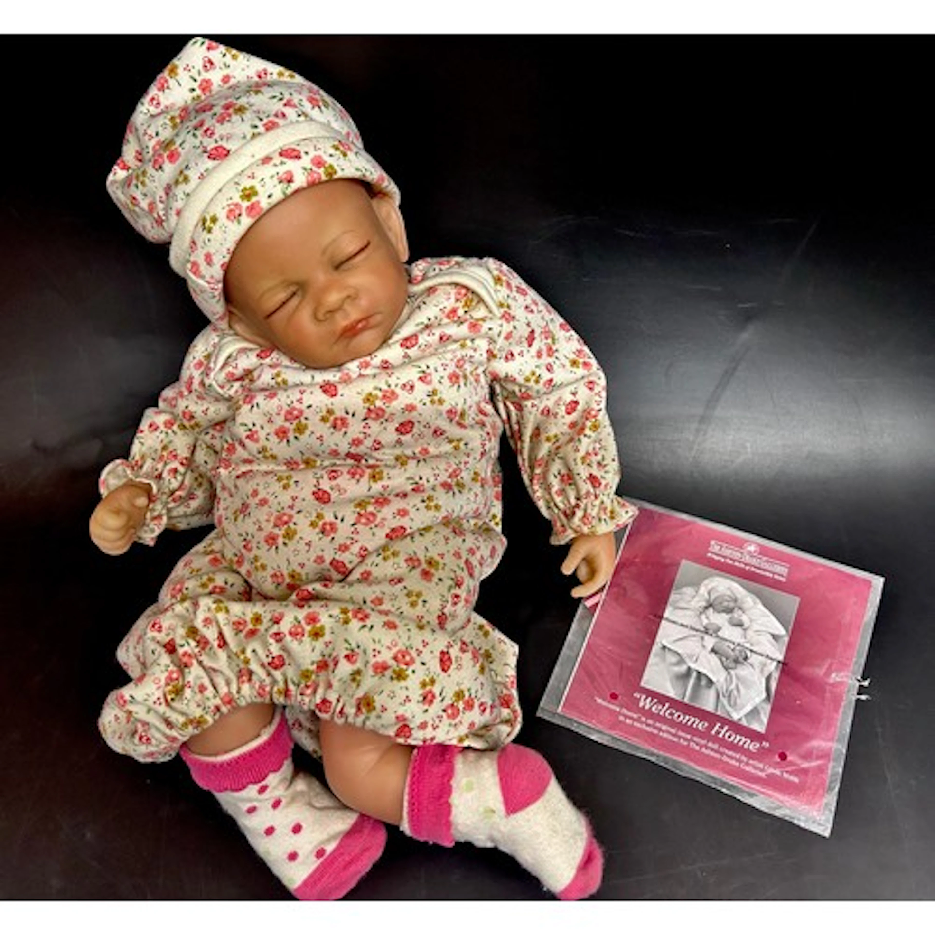 A doll from The Ashton Drake Galleries, 'Welcome Home' with ...