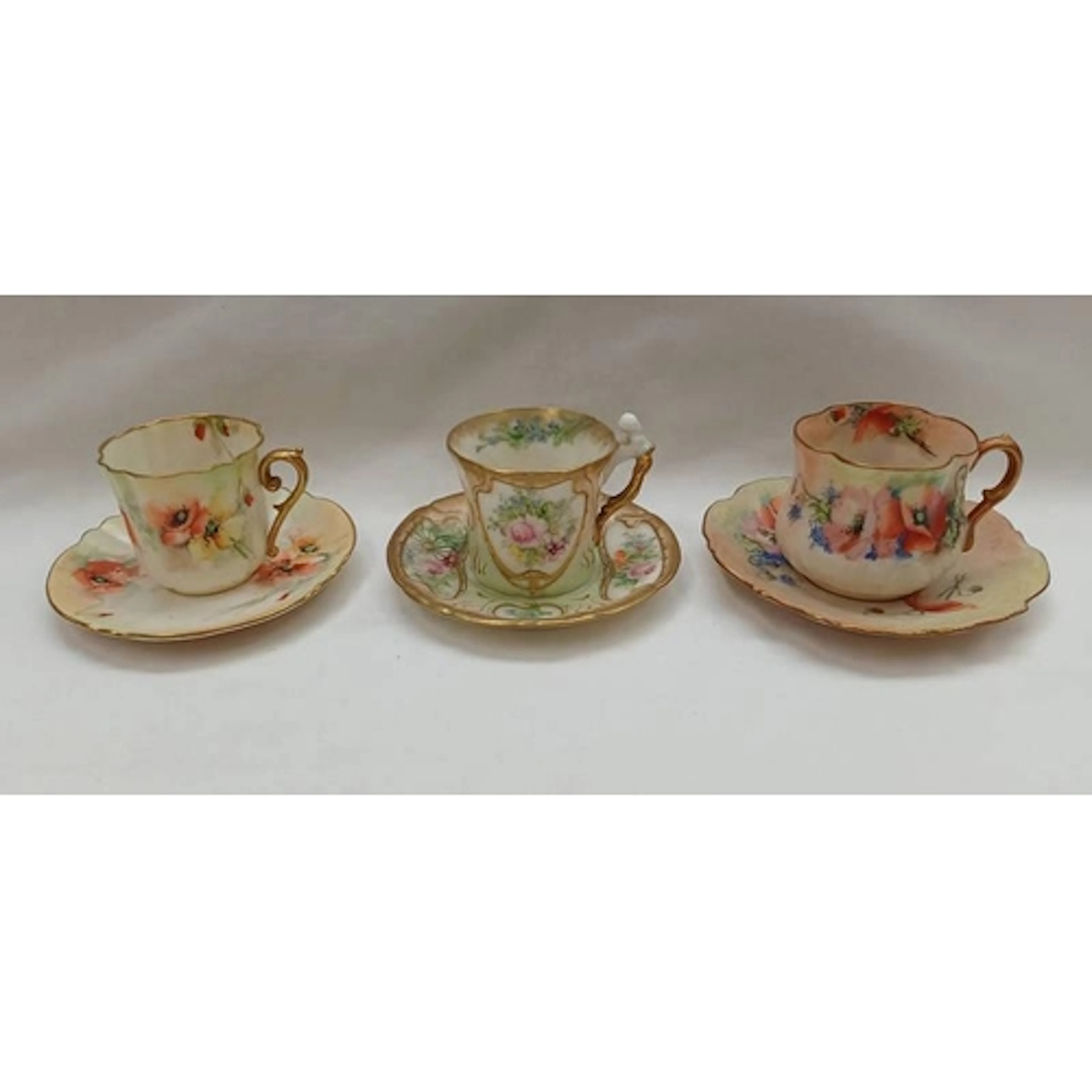3 NAUTILUS PORCELAIN CUPS & SAUCERS WITH FLORAL DECORATION