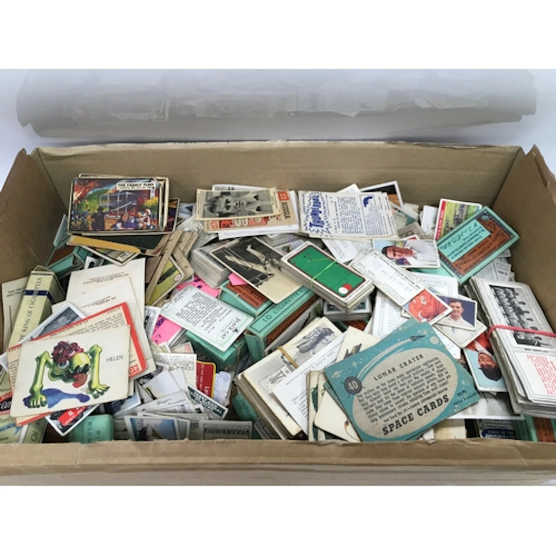 box containing a large collection of vintage trade cards, in...