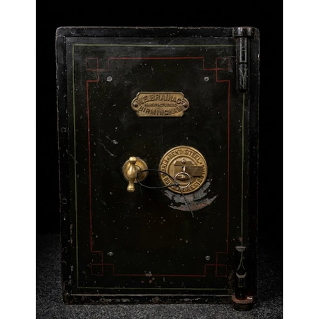 An early 20th century iron and steel floor safe manufactured...