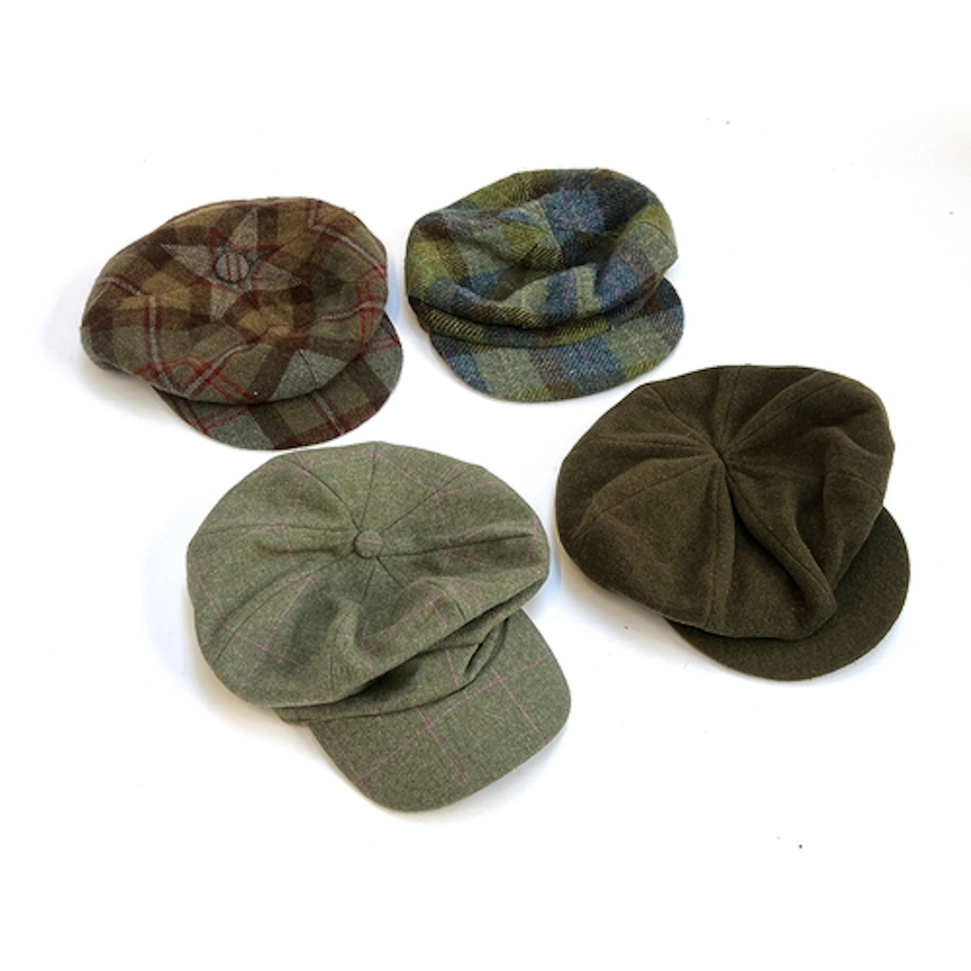A House of Bruar wool 8 piece cap; a Harris Tweed cap; a lad...