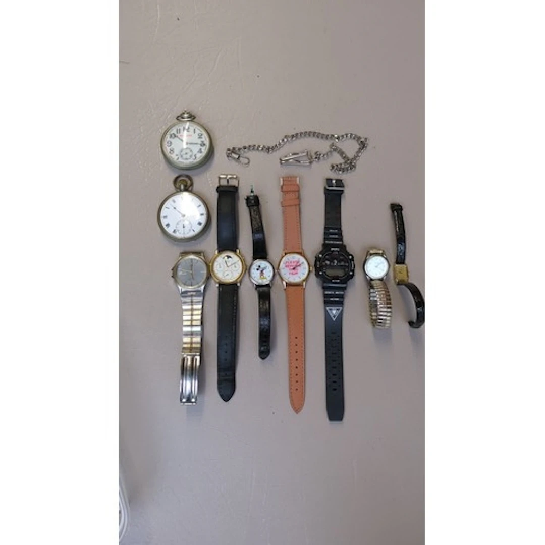 A collection of wristwatches and pocket watches, including S...