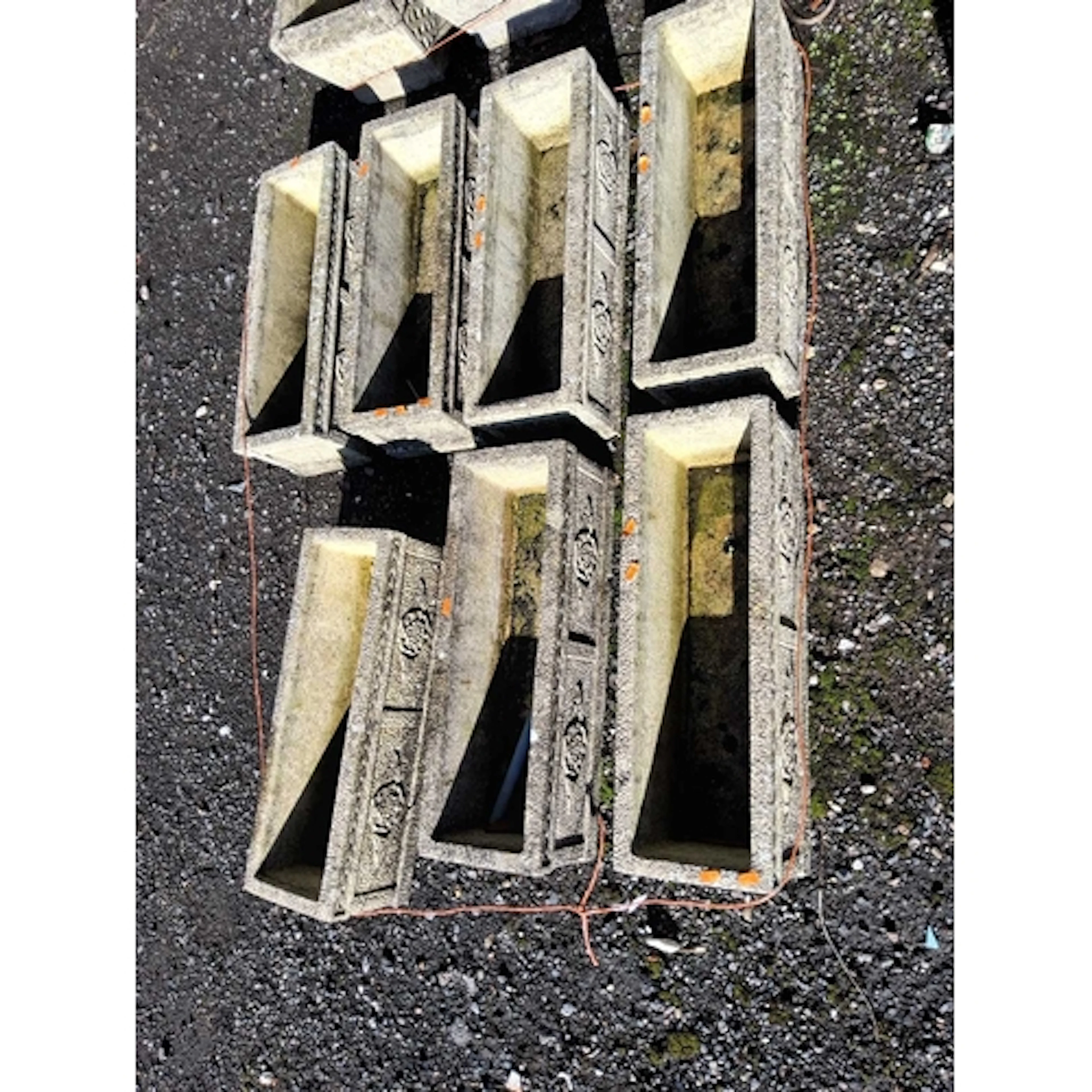 SEVEN COTSWOLD STONE OBLONG CONCRETE PLANTERS with rose boss...
