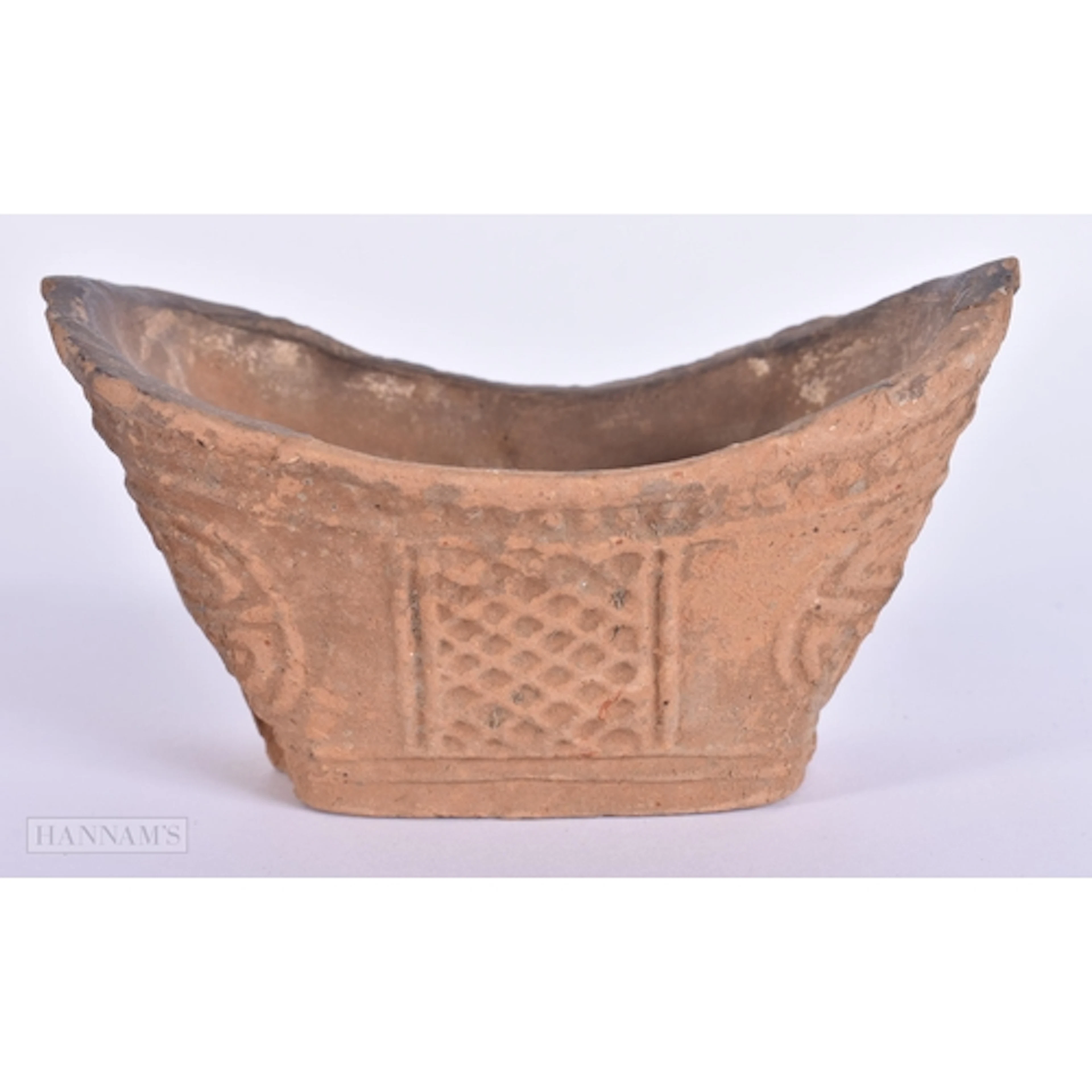 A RARE CHINESE HAN DYNASTY POTTERY INGOT FORM VESSEL 206 BC ...
