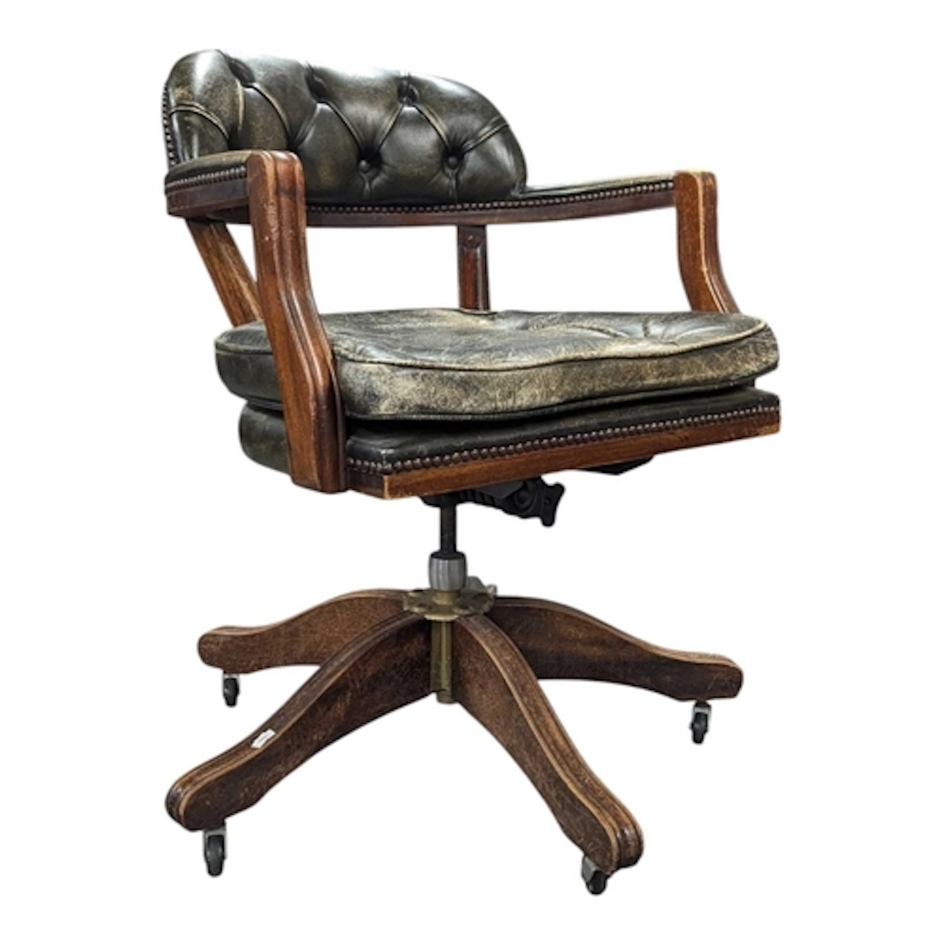 A 20th century Chesterfield style captain style swivel offic...