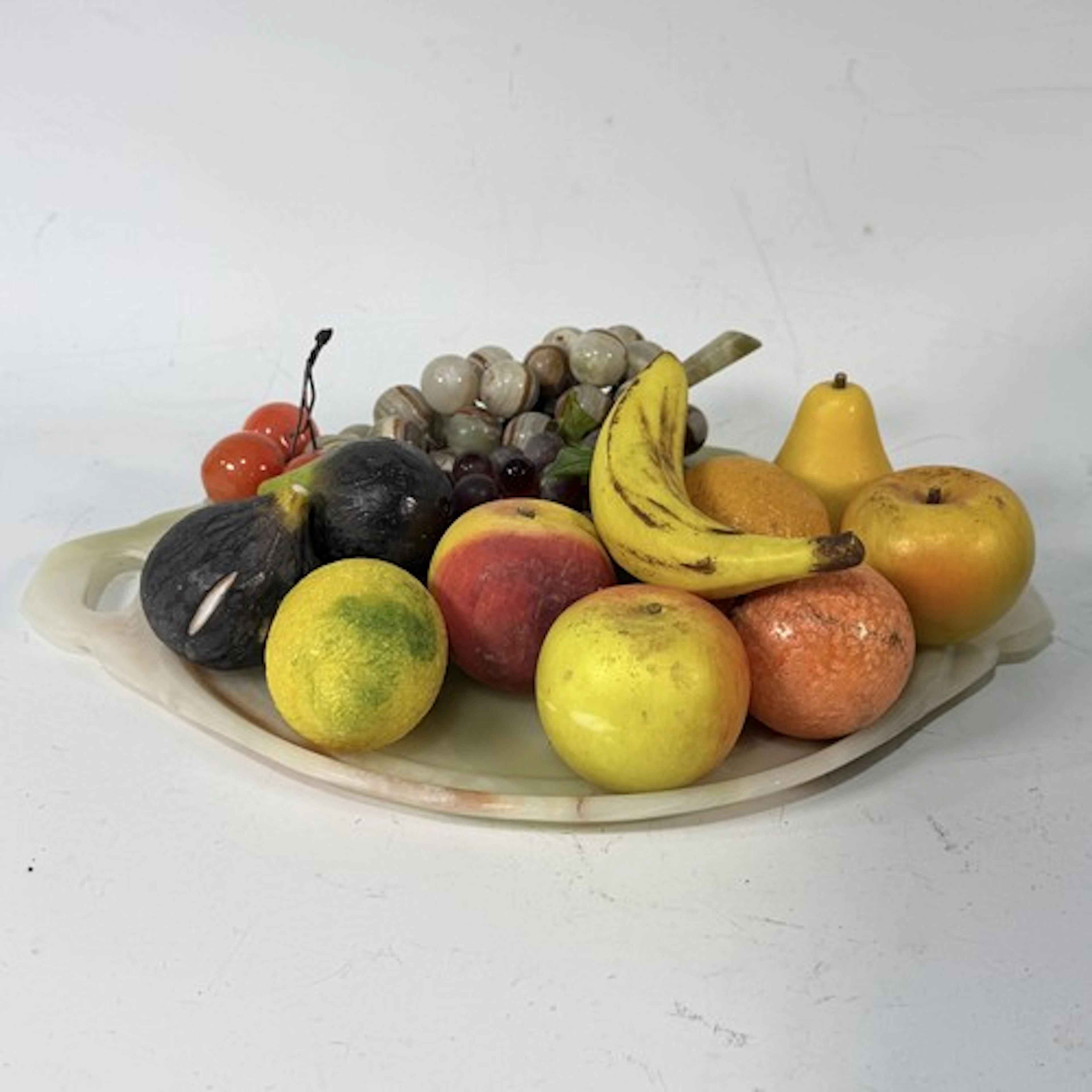 A collection of 19th century alabaster and stone novelty tab...