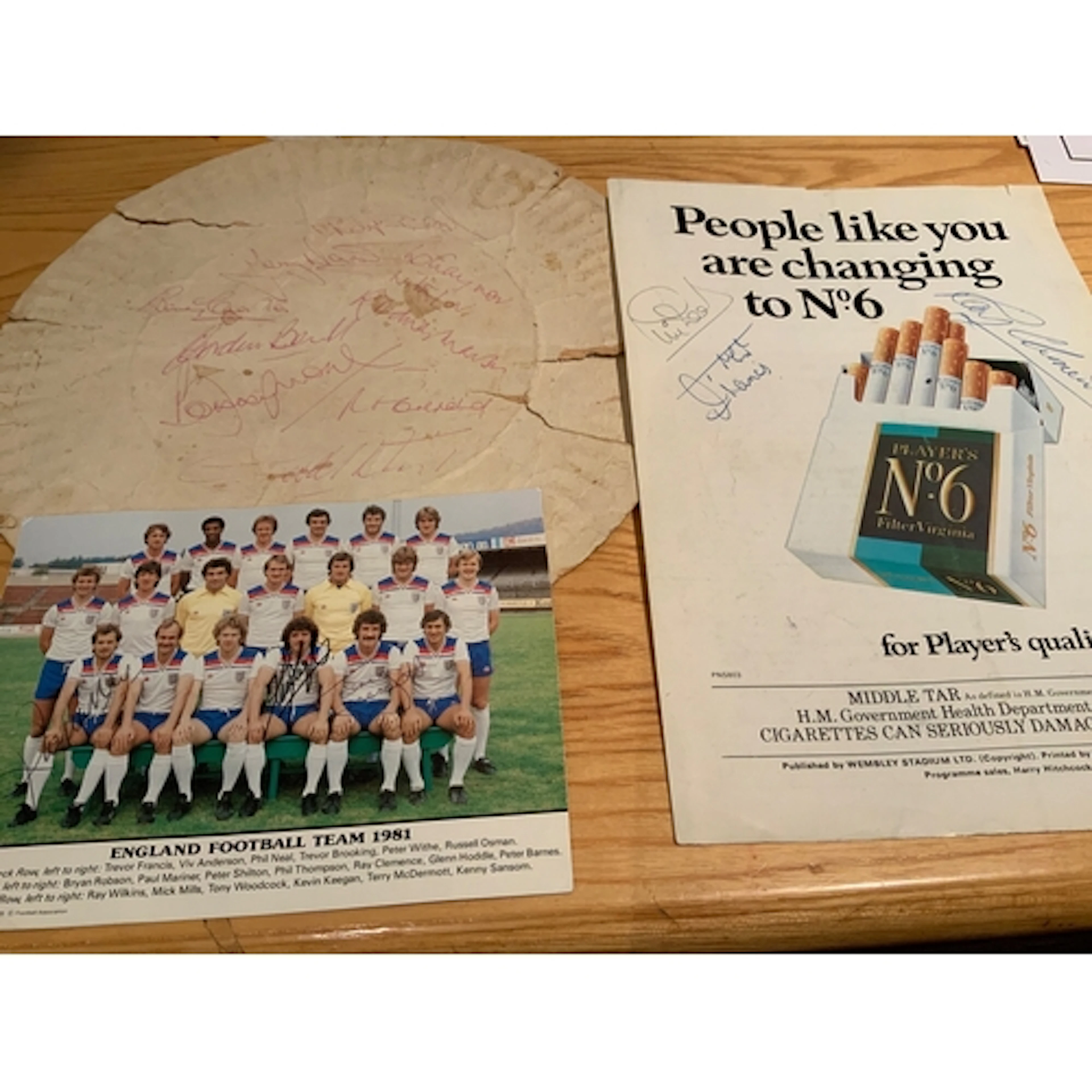 Signed Football Memorabilia: Torn paper plate signed to rear...