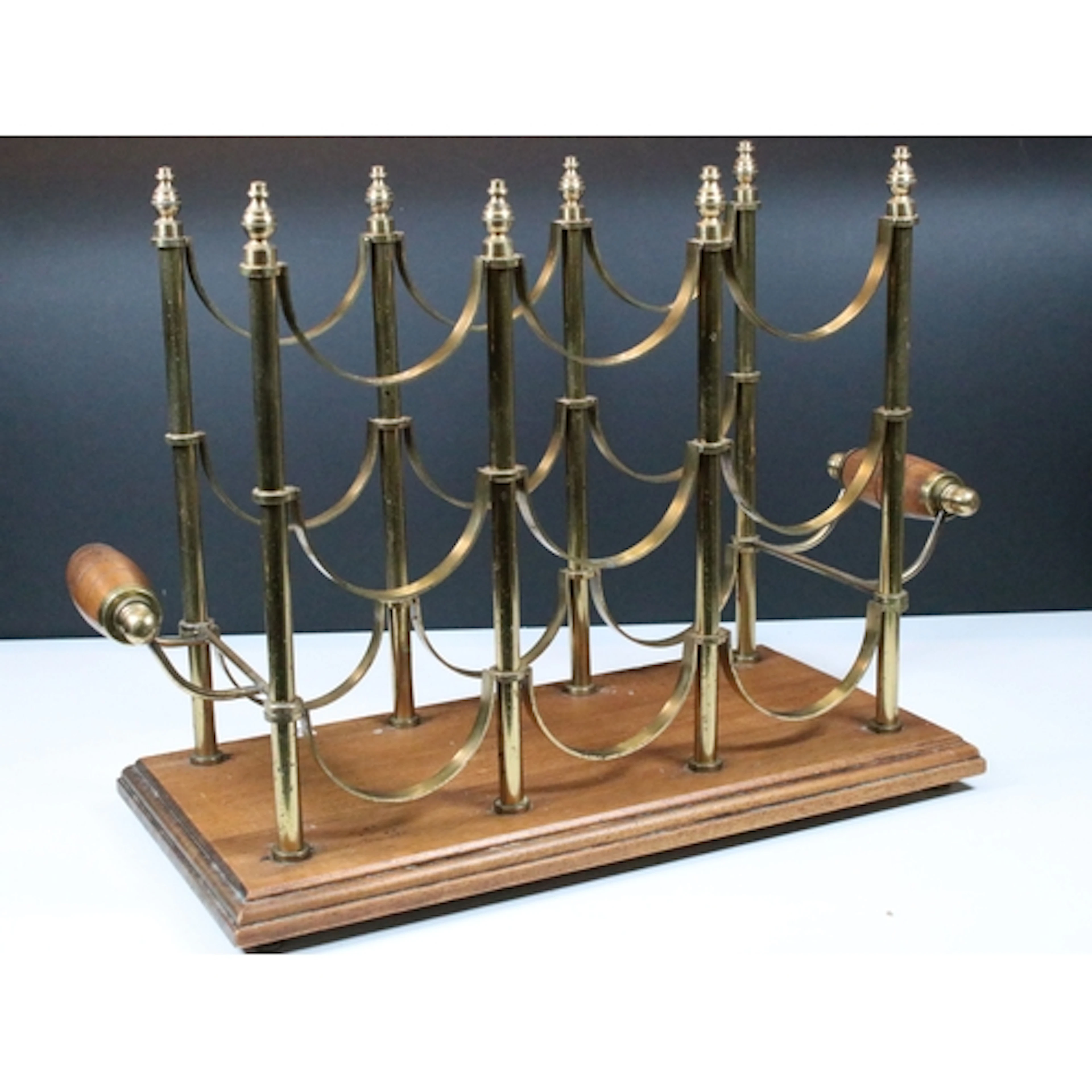 20th century wine rack, oak base with oak turned handles and...