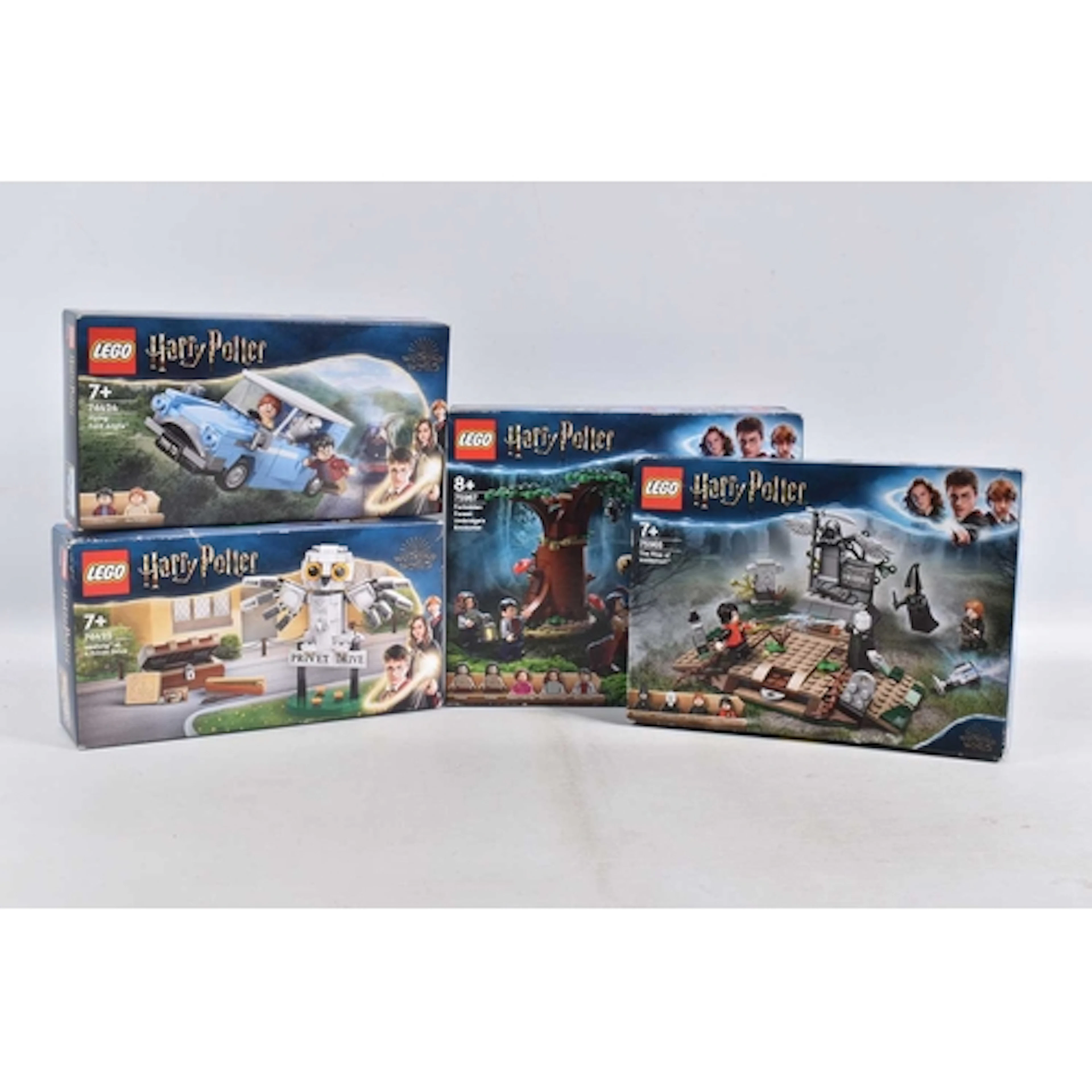 FOUR BOXED AND SEALED WIZARDING WORLD HARRY POTTER LEGO SETS...