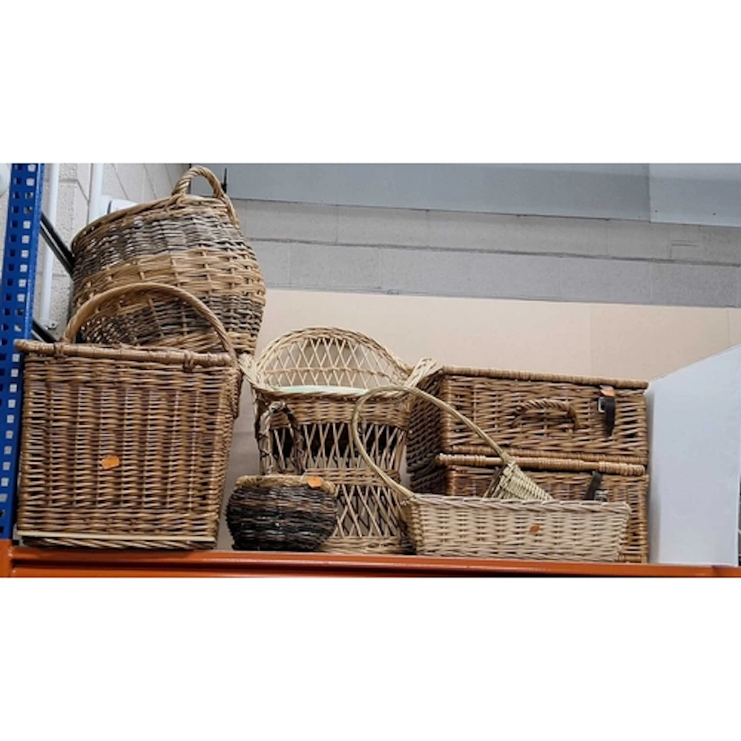 A GROUP OF WICKER BASKETS, HAMPERS AND A CHAIR, to include a...