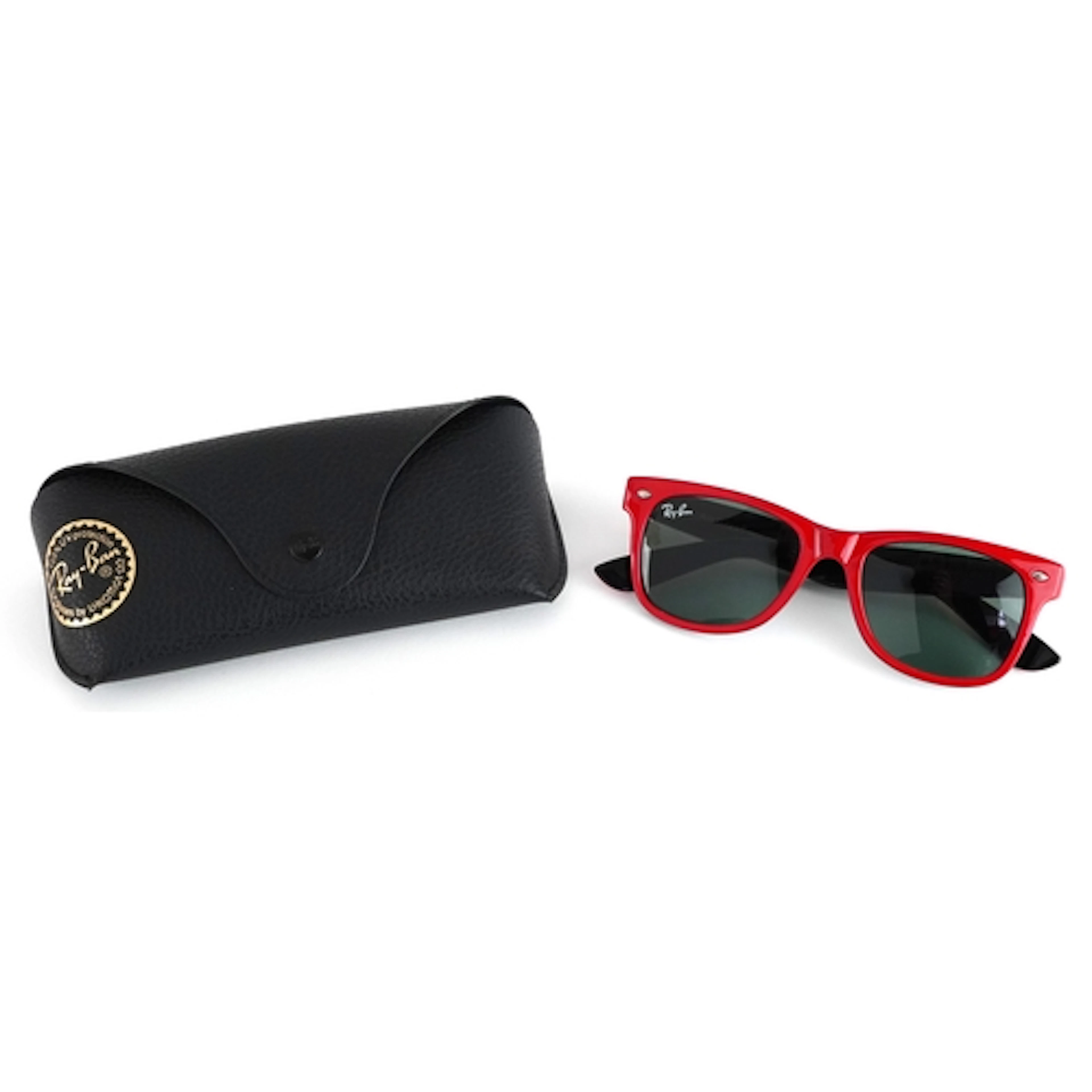 Pair of vintage Ray-Ban Wayfarer sunglasses with red frames ...