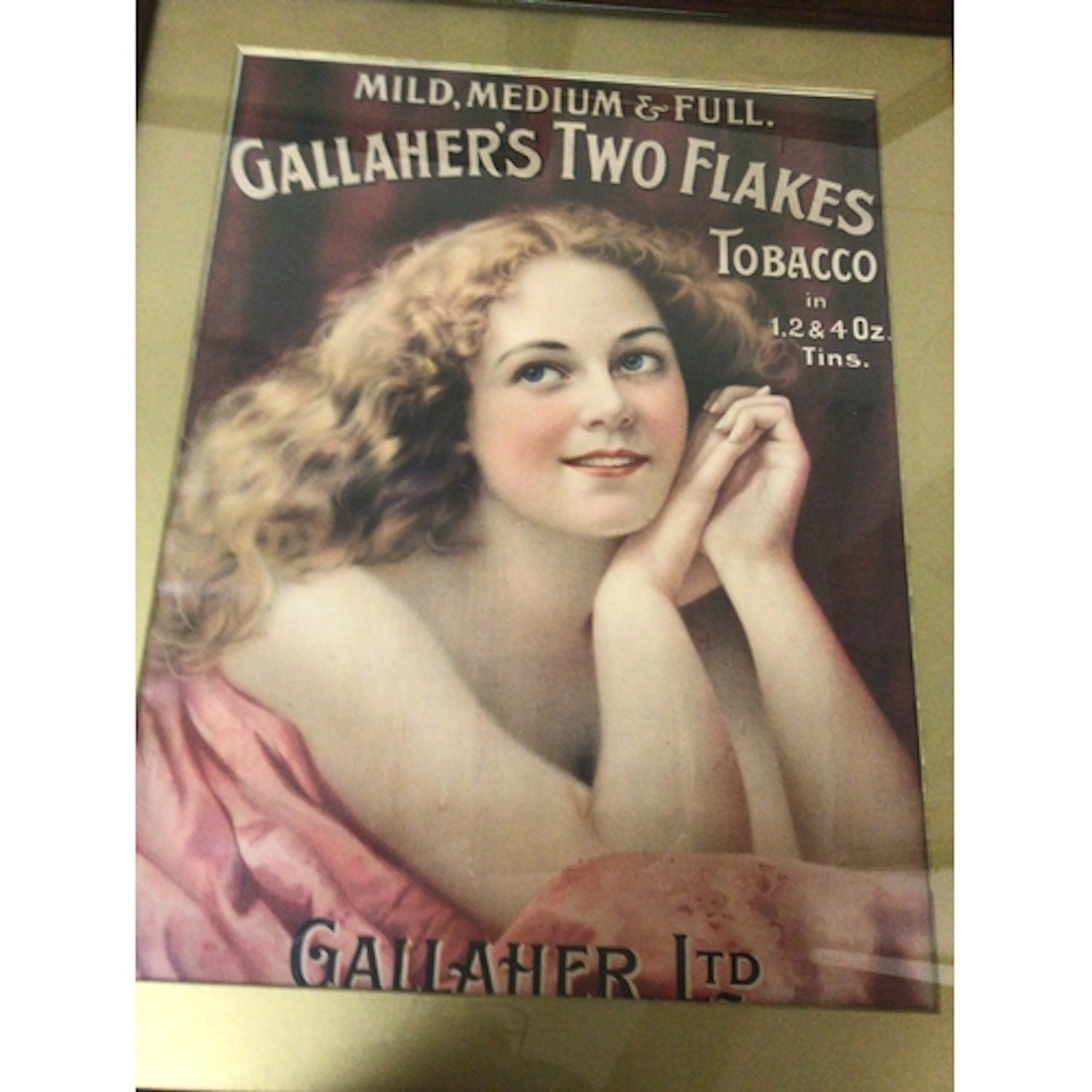 A Vintage Gallaher’s Two flake Tobbaco advertisement in an o...