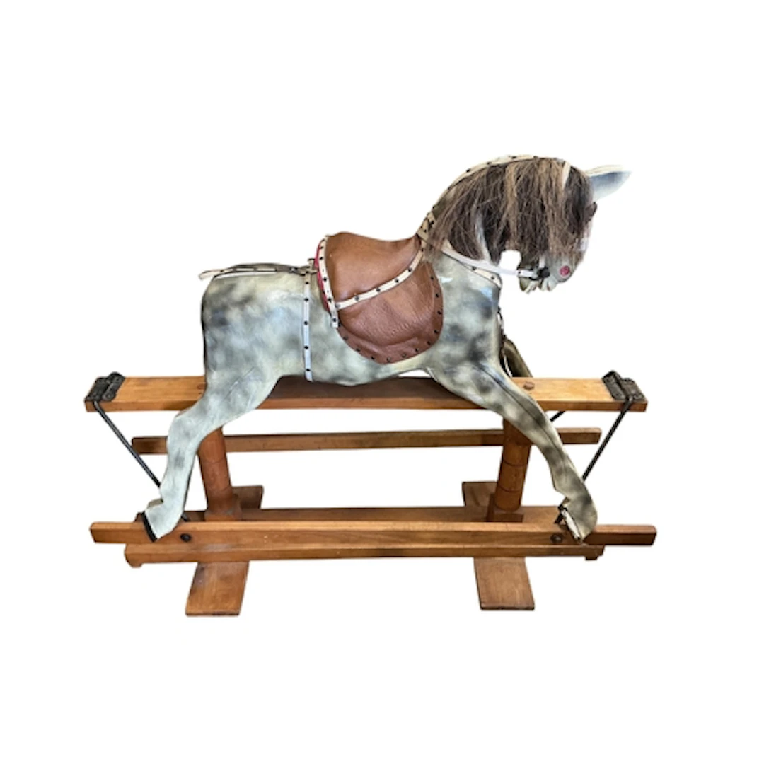 An early 20th century grey- painted rocking horse, without m...