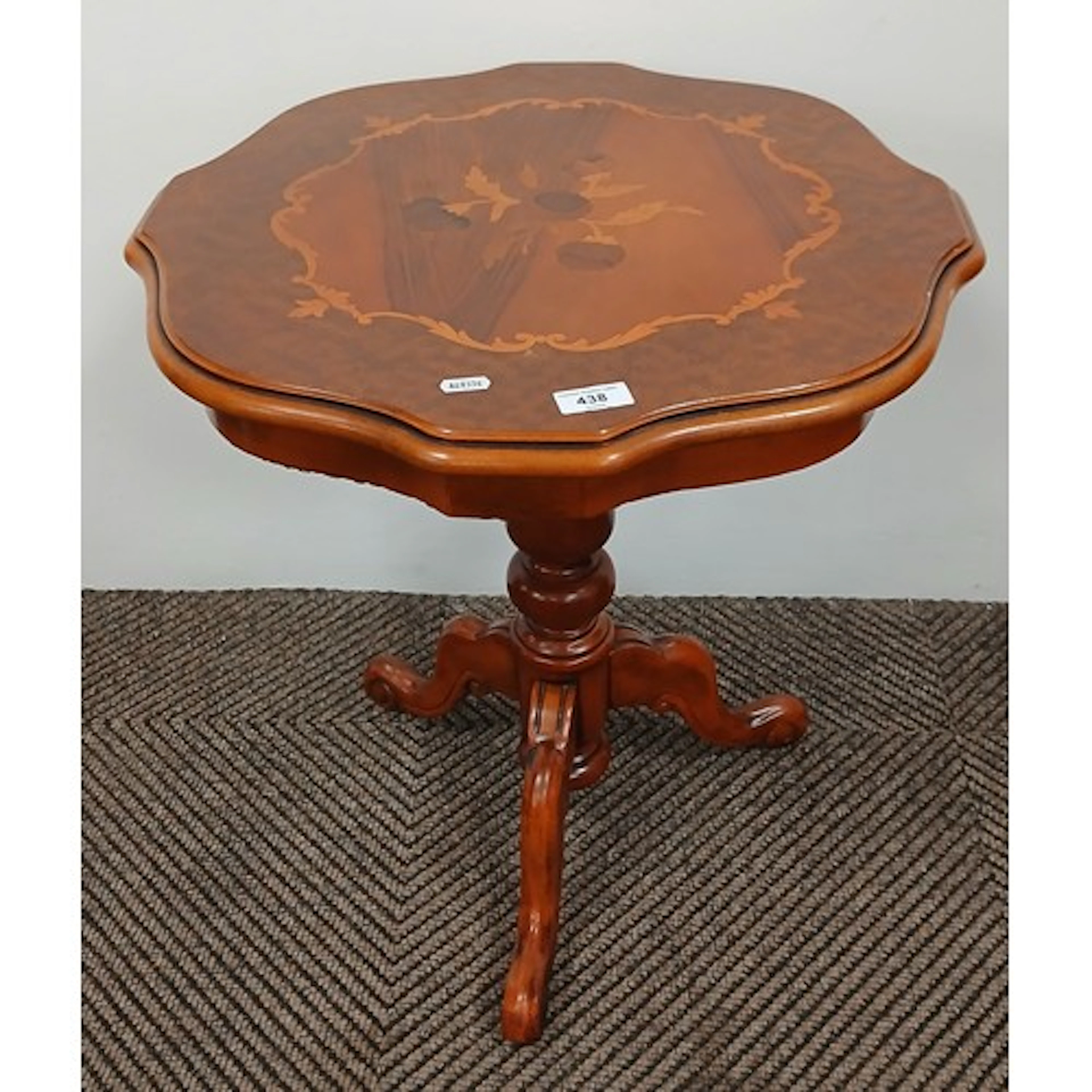Reproduction tripod table.