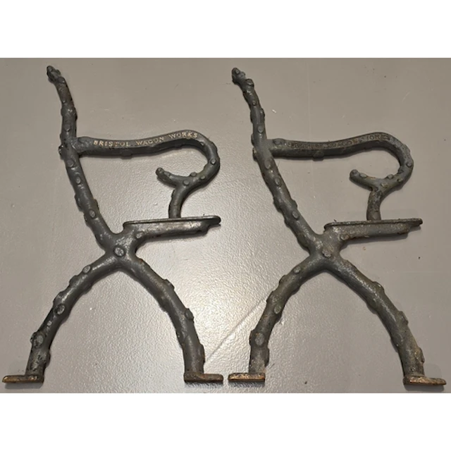 A pair of antique grey painted heavy cast iron "Bristol Wago...
