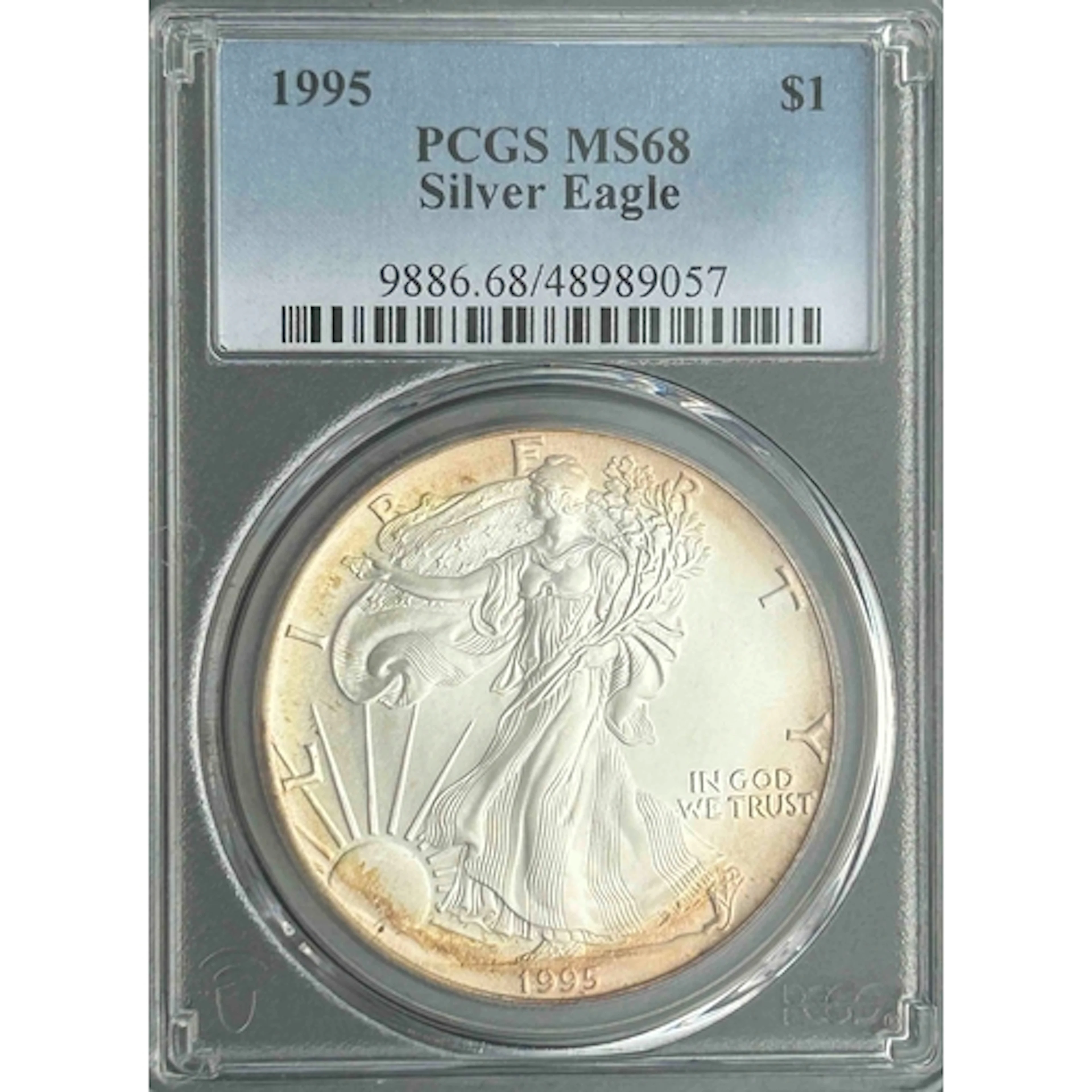 1995 USA $1 silver Eagle coin, slabbed and graded by P.C.G.S...