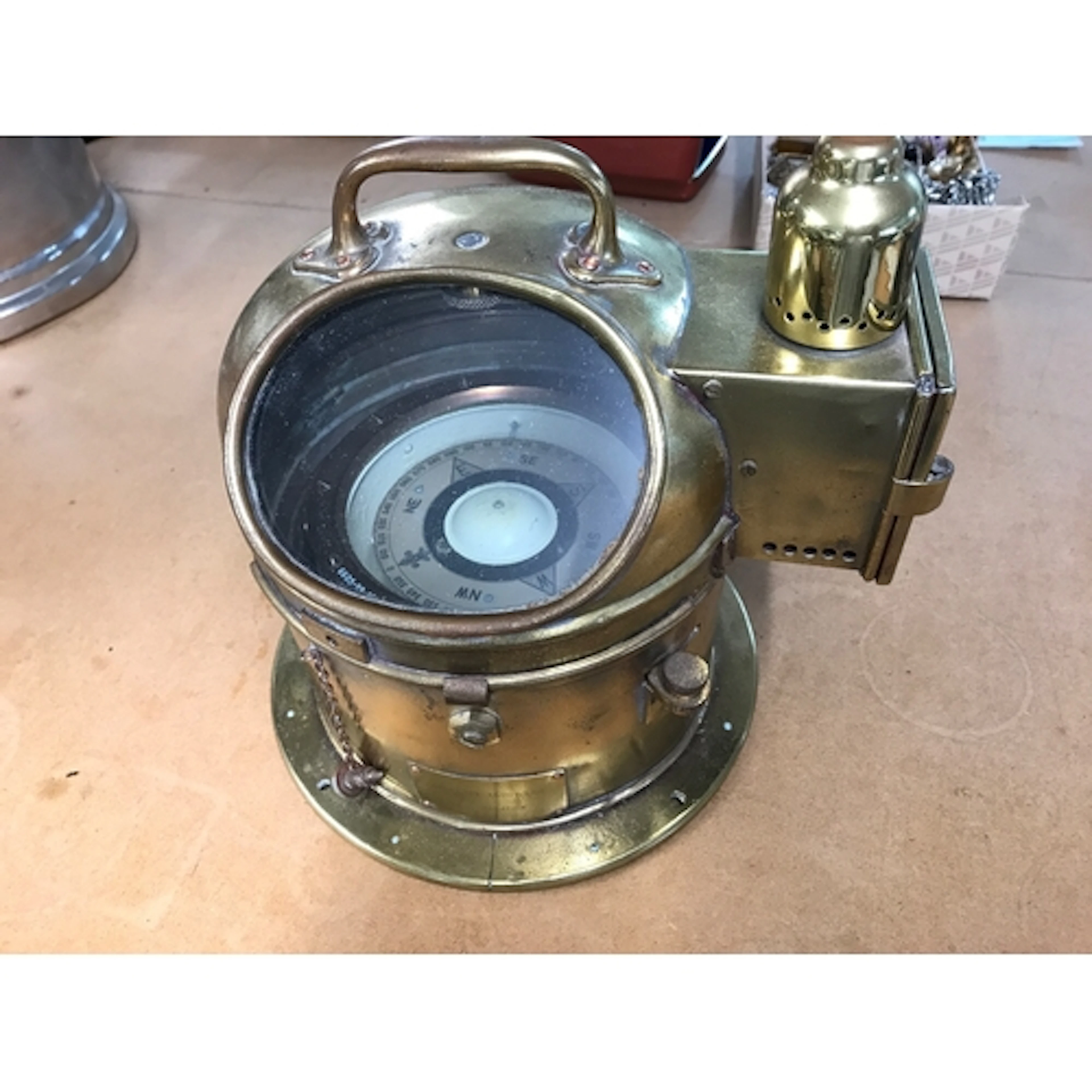 A vintage ships Binnacle compass crafted from brass.