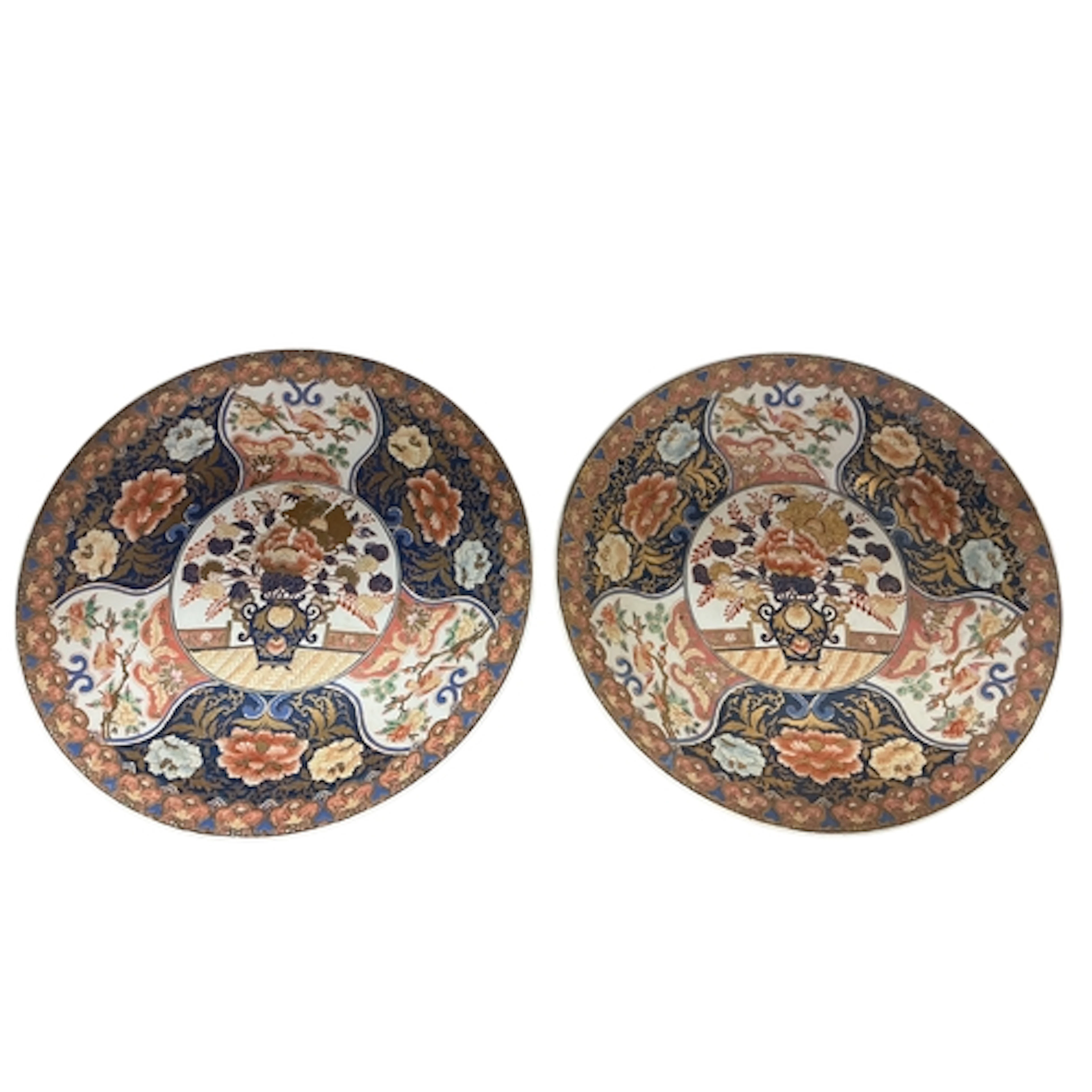 A pair of decorative Imari chargers, diameter 46cm.