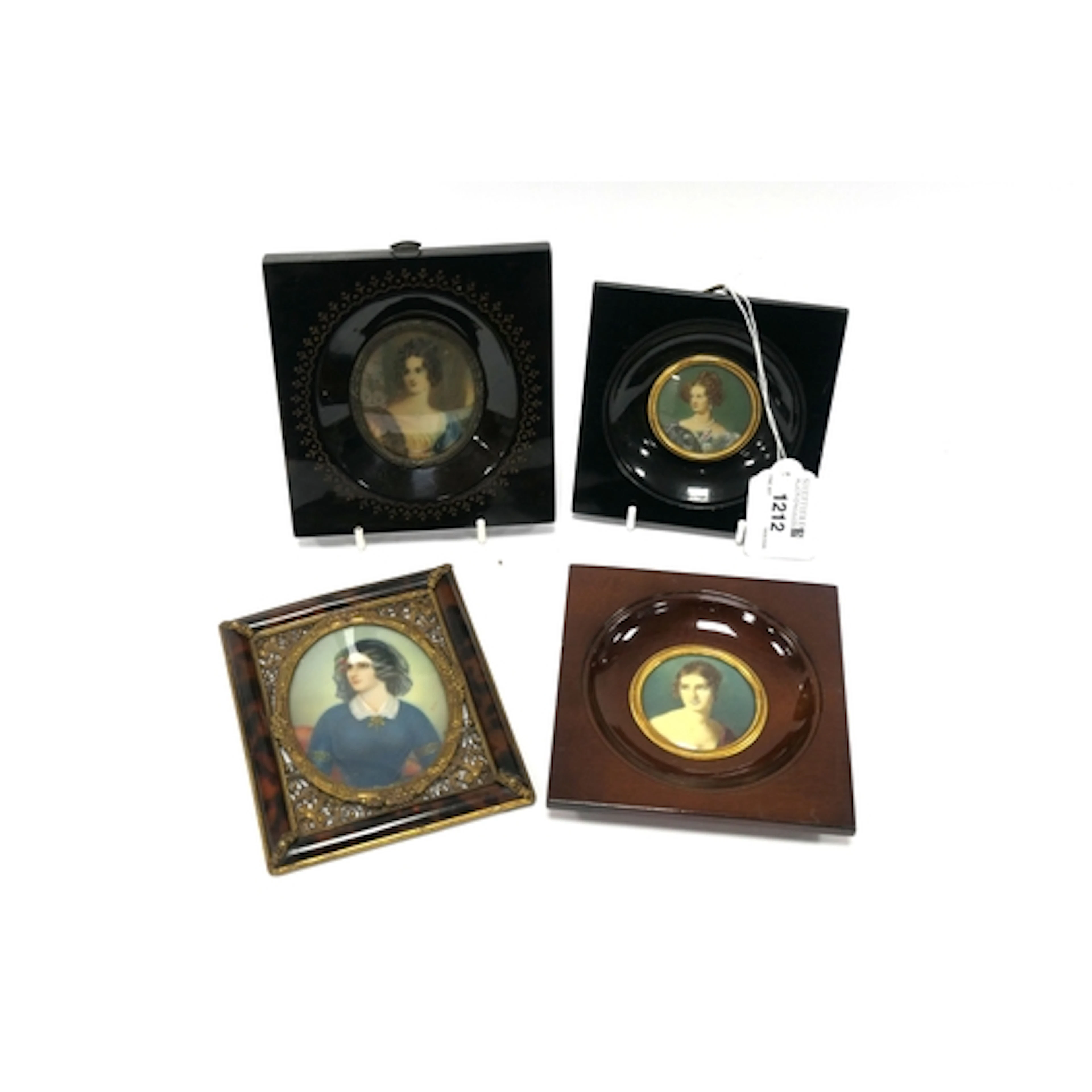 A XX Century Portrait Miniature, of a lady wearing black vei...
