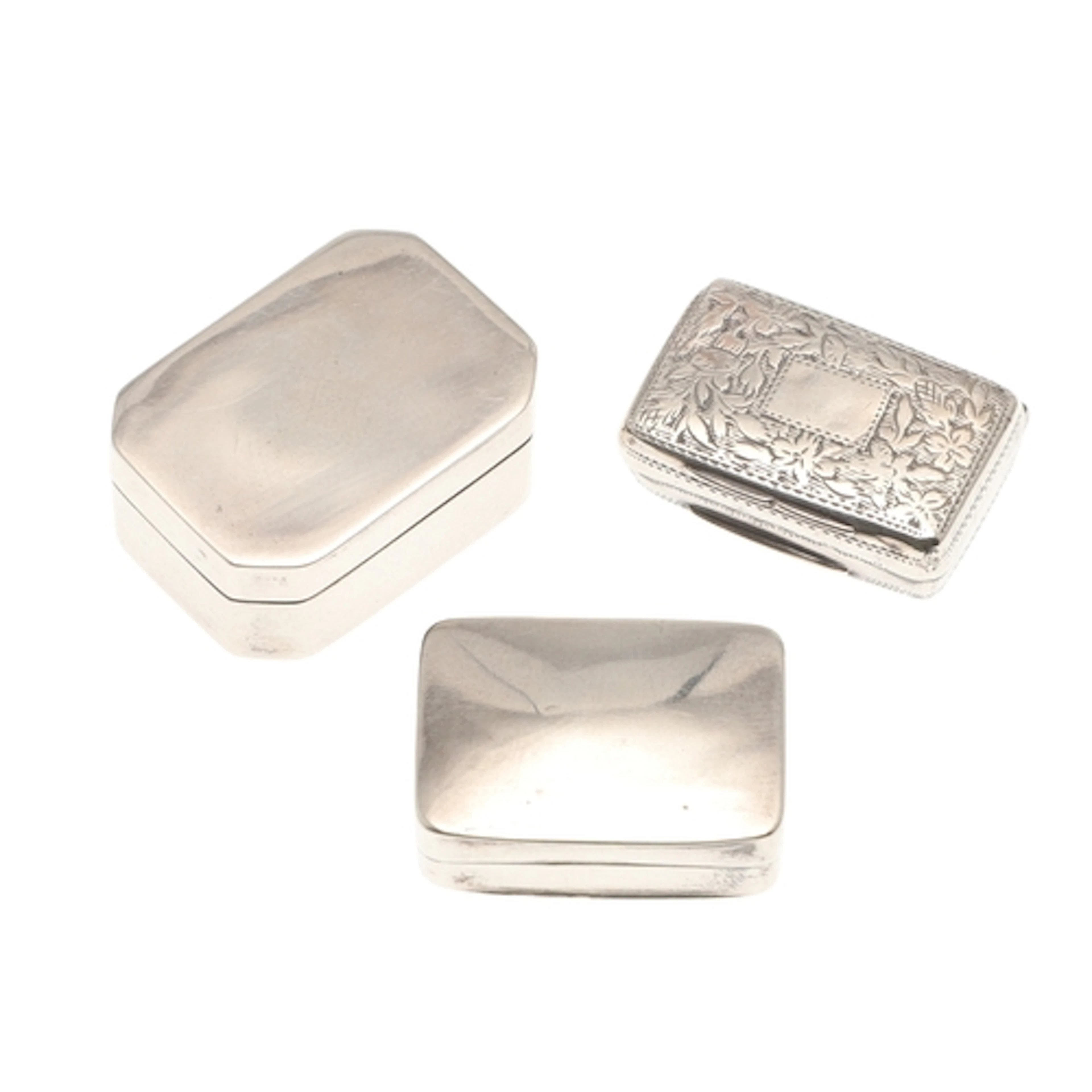 THREE 19TH CENTURY SILVER VINAIGRETTES. All of rectangular f...