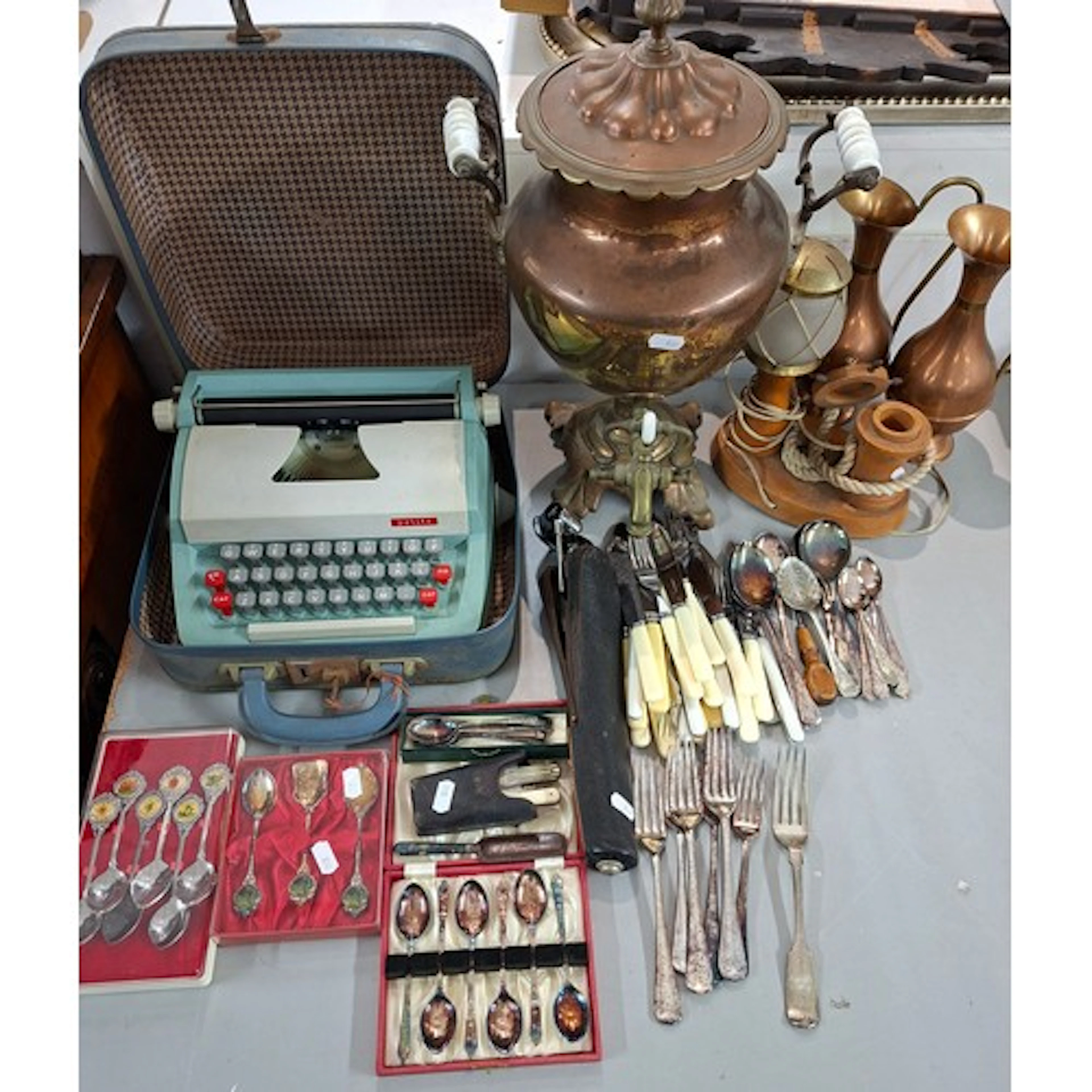 A copper samovar, mixed cutlery to include a silver serving ...